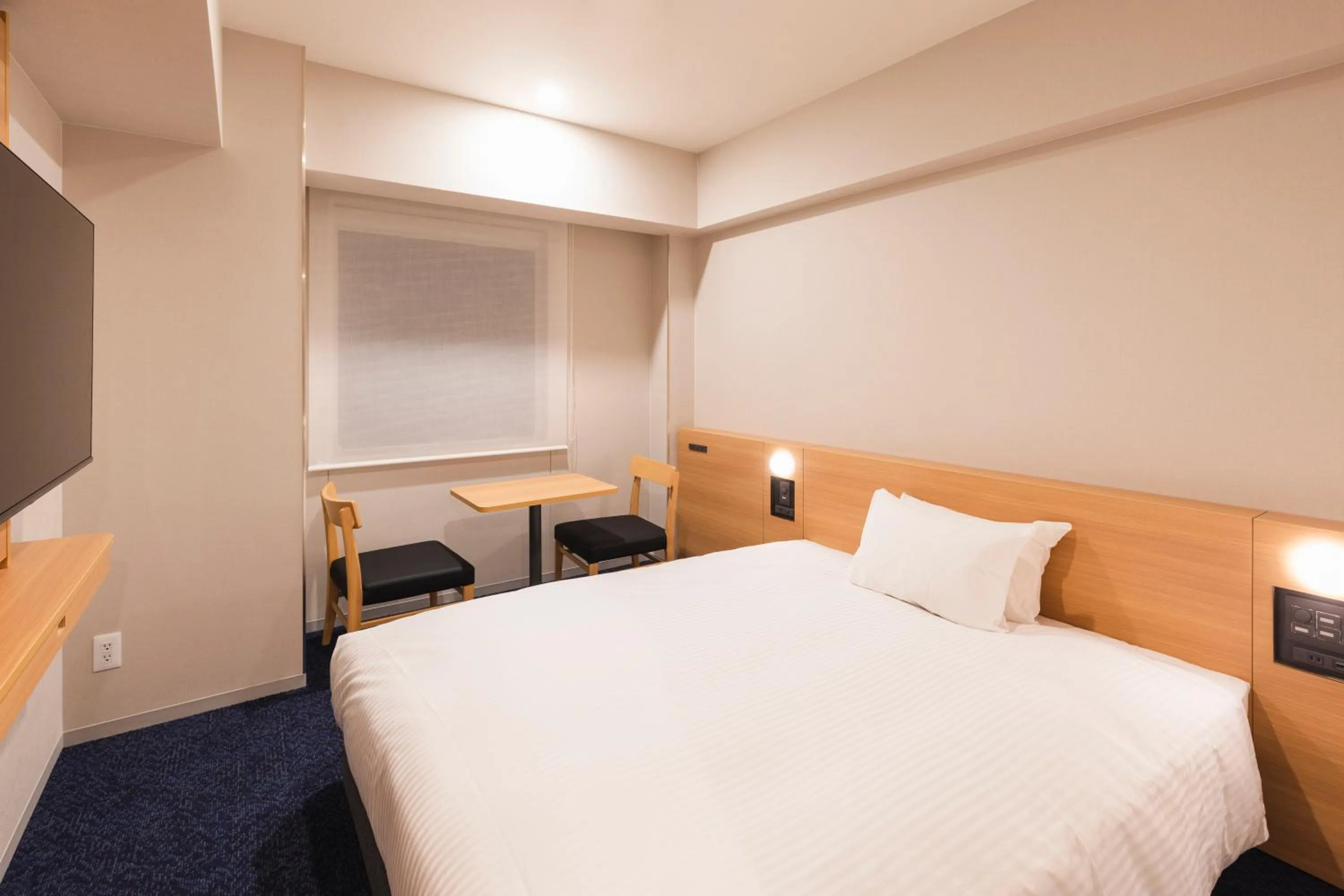 Bed in Sotetsu Grand Fresa Kumamoto