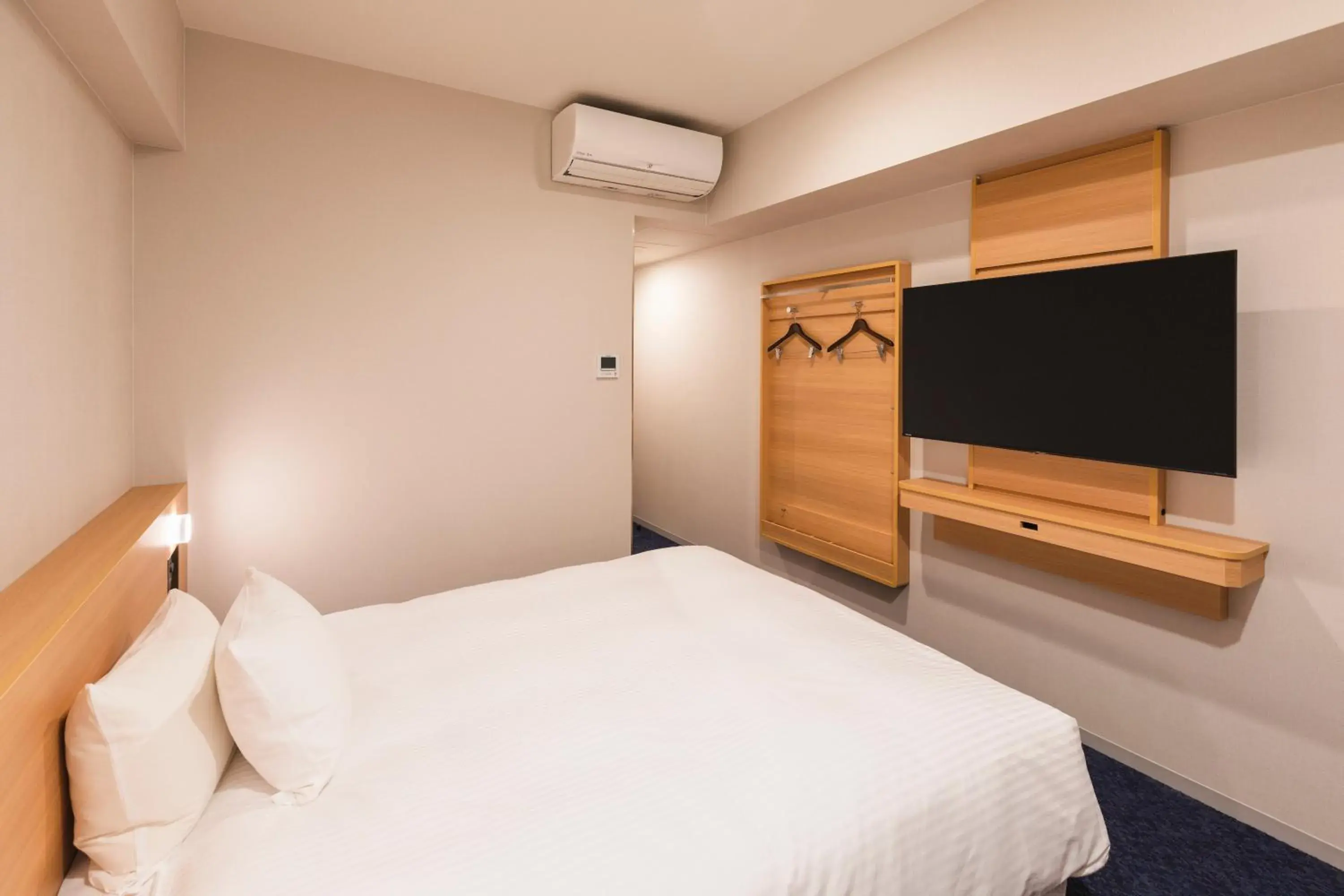 Bed in Sotetsu Grand Fresa Kumamoto Bed in Sotetsu Grand Fresa Kumamoto