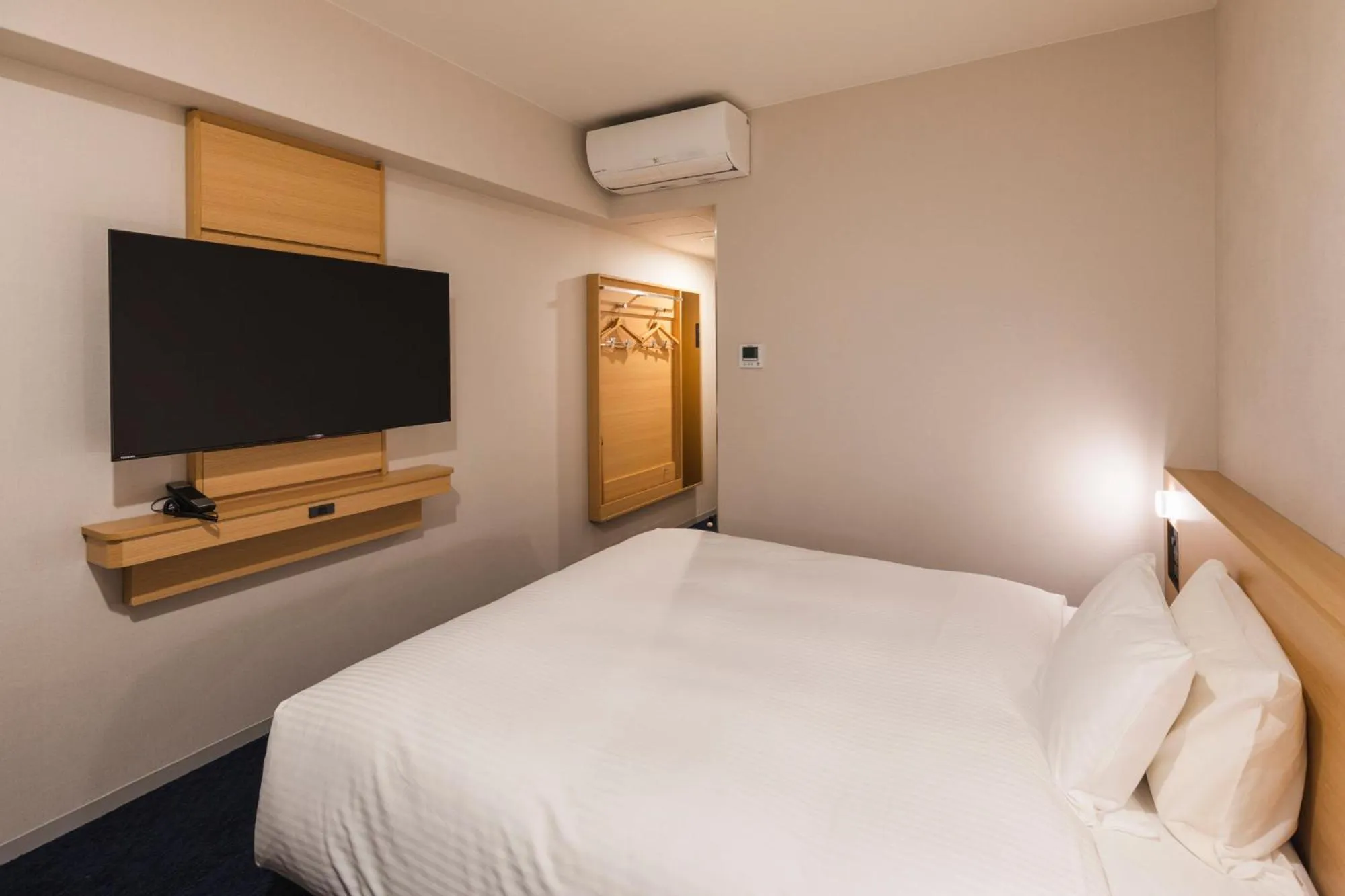 Bed in Sotetsu Grand Fresa Kumamoto