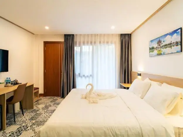 Bed in New Champa Boutique Hotel Bed in New Champa Boutique Hotel