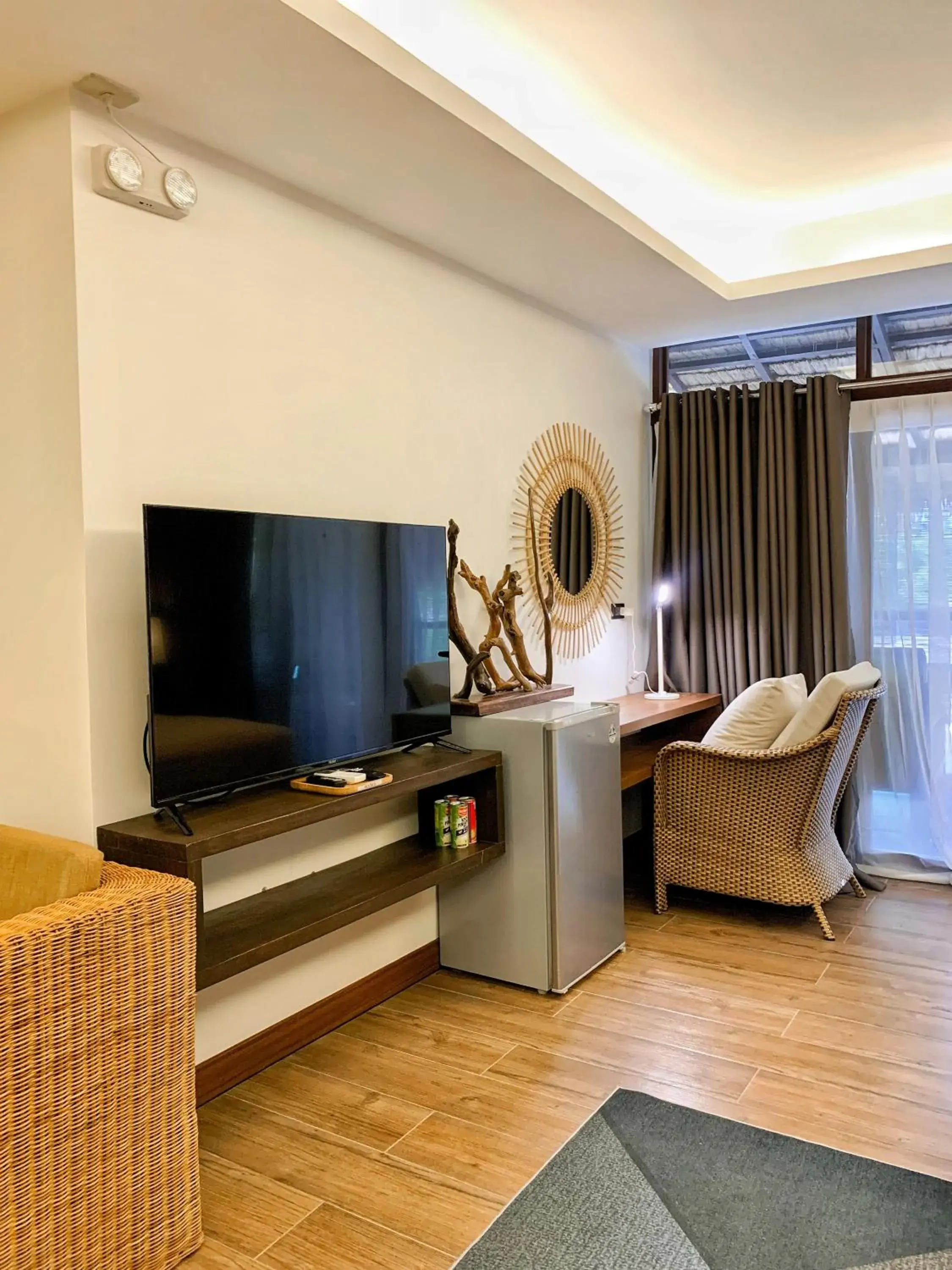 Communal lounge/ TV room, Bed in Banig Beach Resort El Nido Communal lounge/ TV room, Bed in Banig Beach Resort El Nido