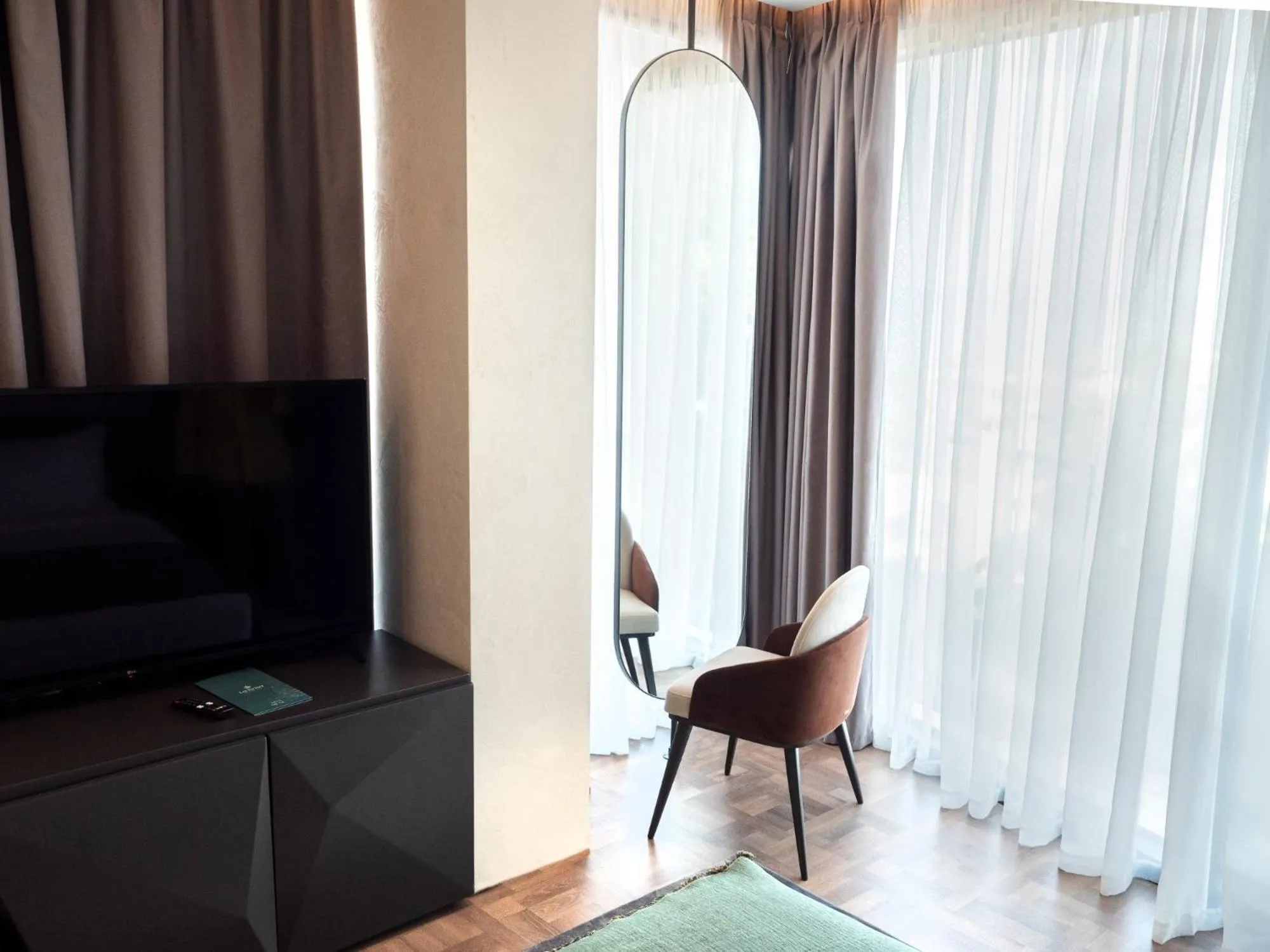 TV and multimedia in La Brisa Boutique Hotel