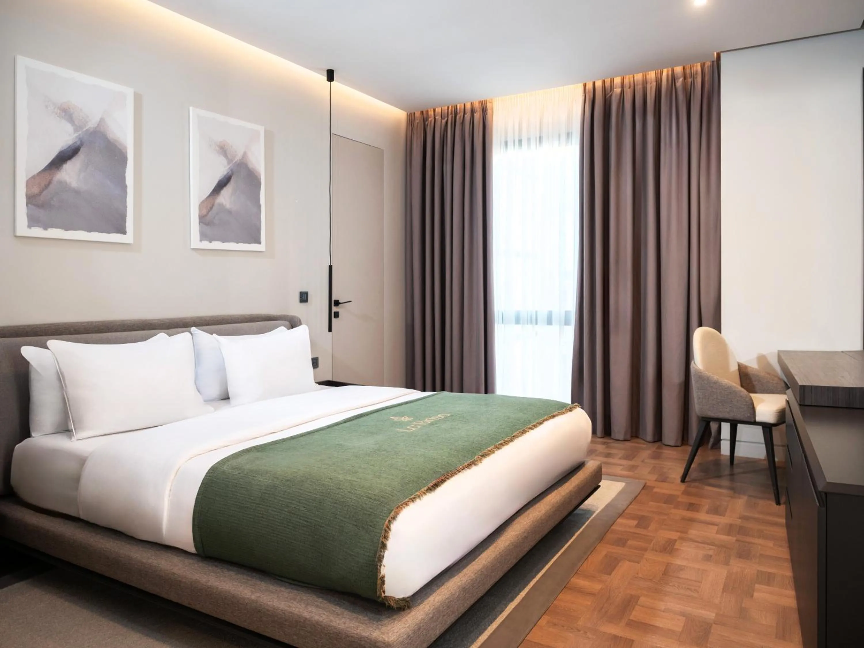 Bed in La Brisa Boutique Hotel