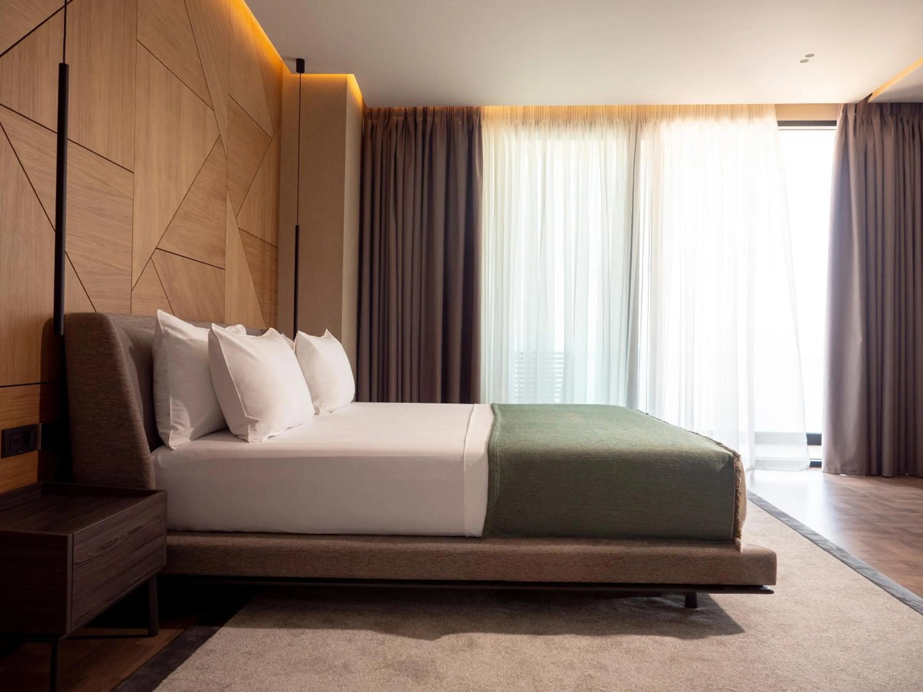 Bed in La Brisa Boutique Hotel