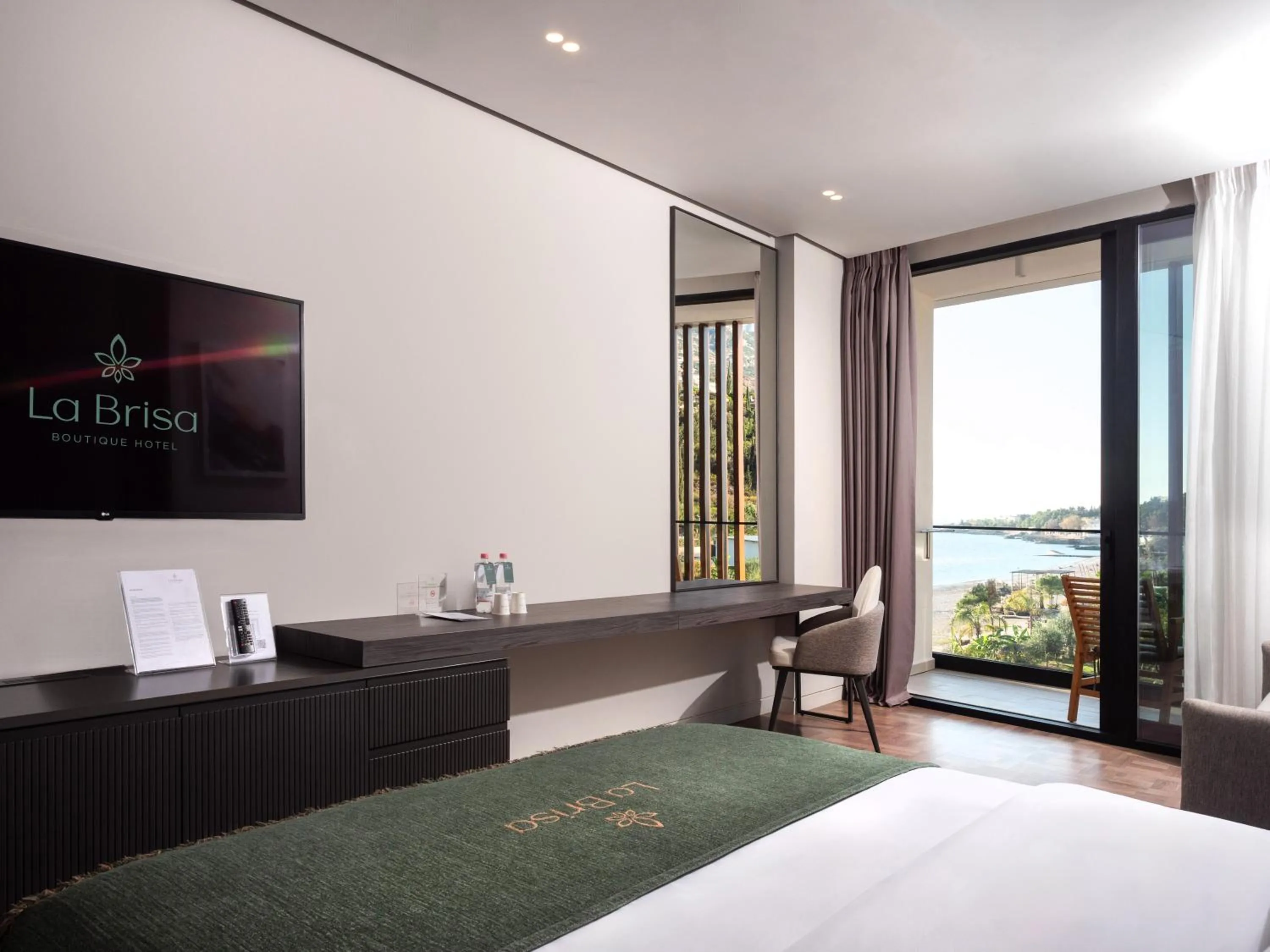 Bed in La Brisa Boutique Hotel