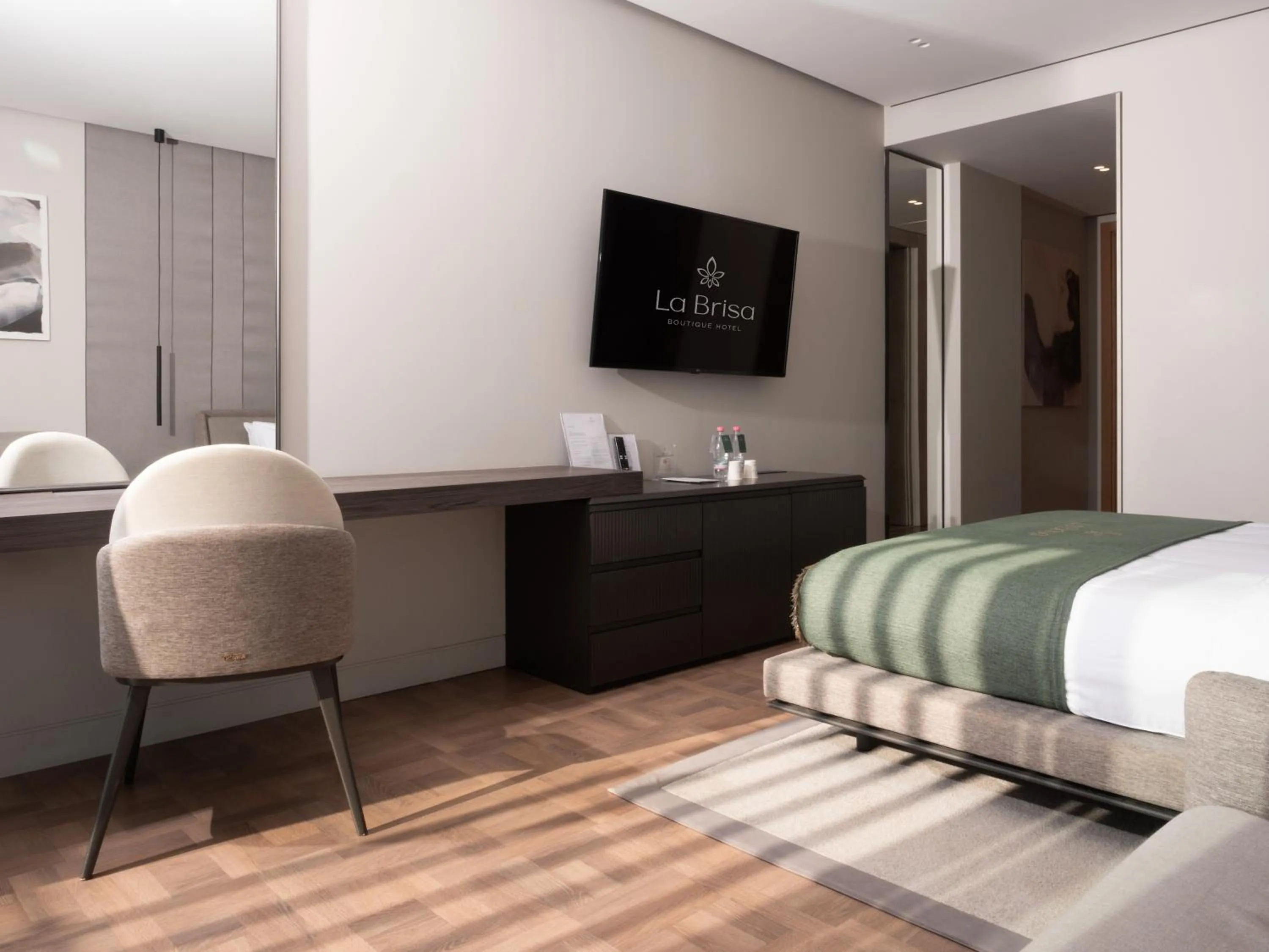 Bed in La Brisa Boutique Hotel