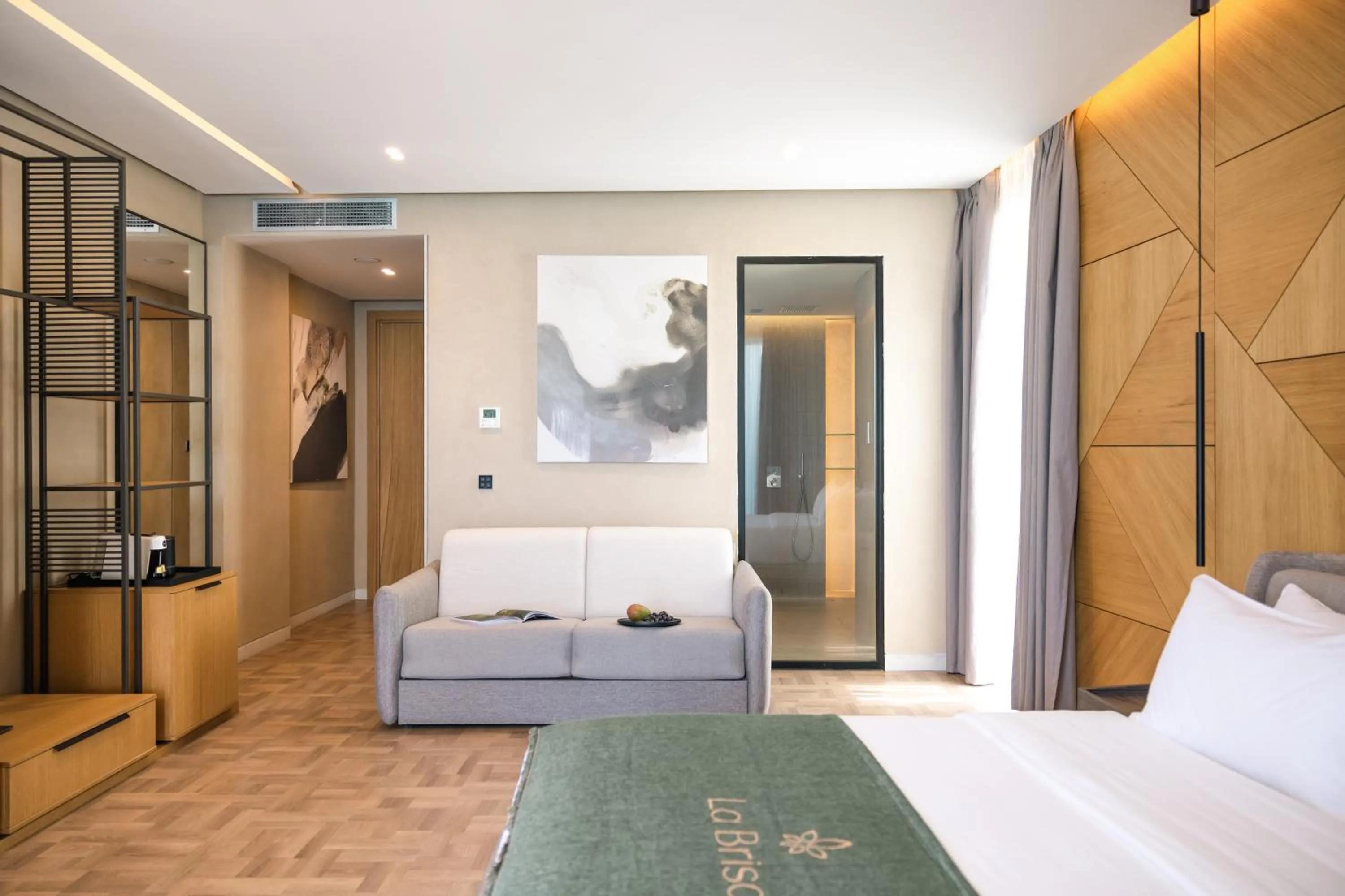 Bed in La Brisa Boutique Hotel
