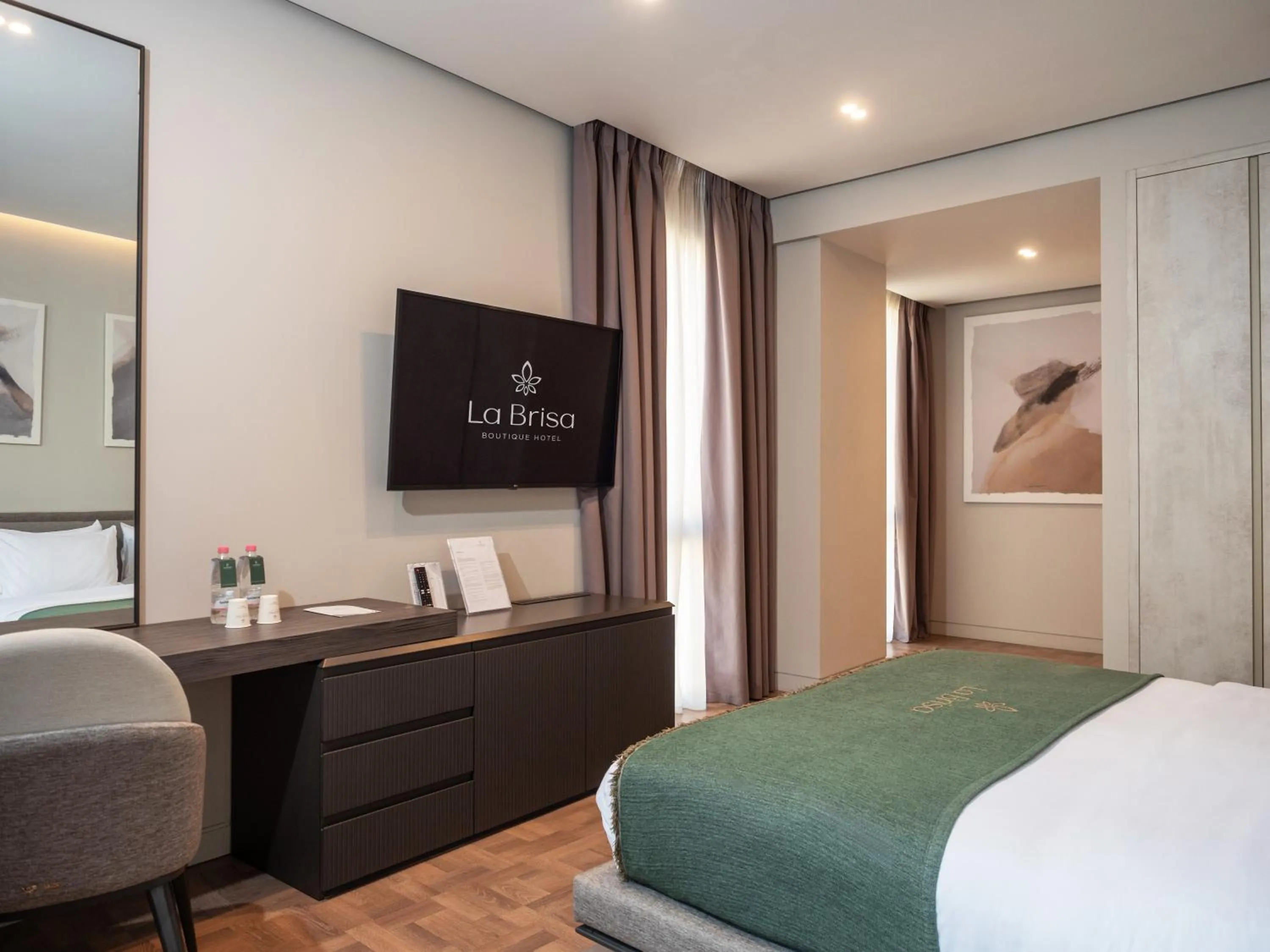 Bed in La Brisa Boutique Hotel