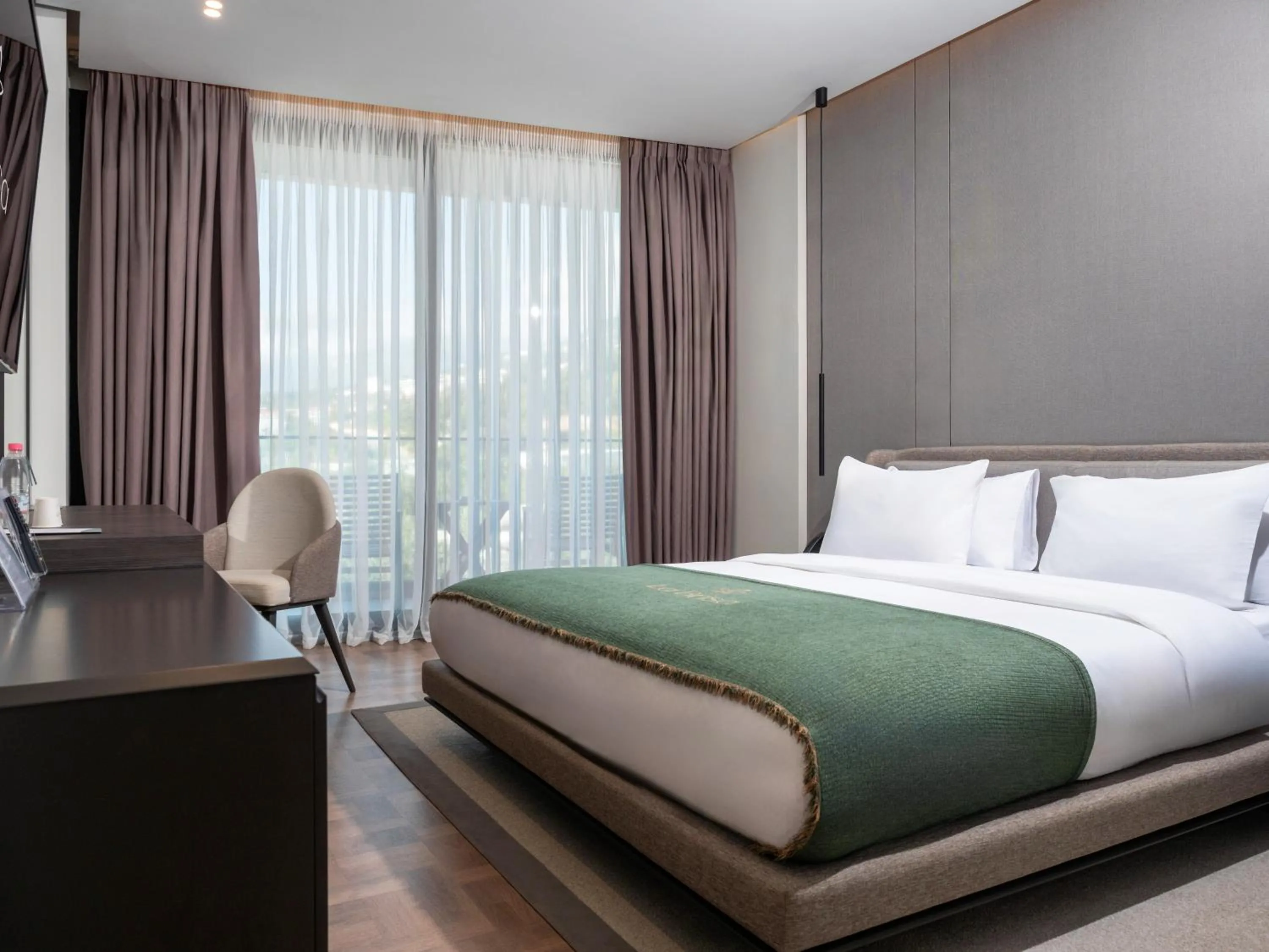 Bed in La Brisa Boutique Hotel