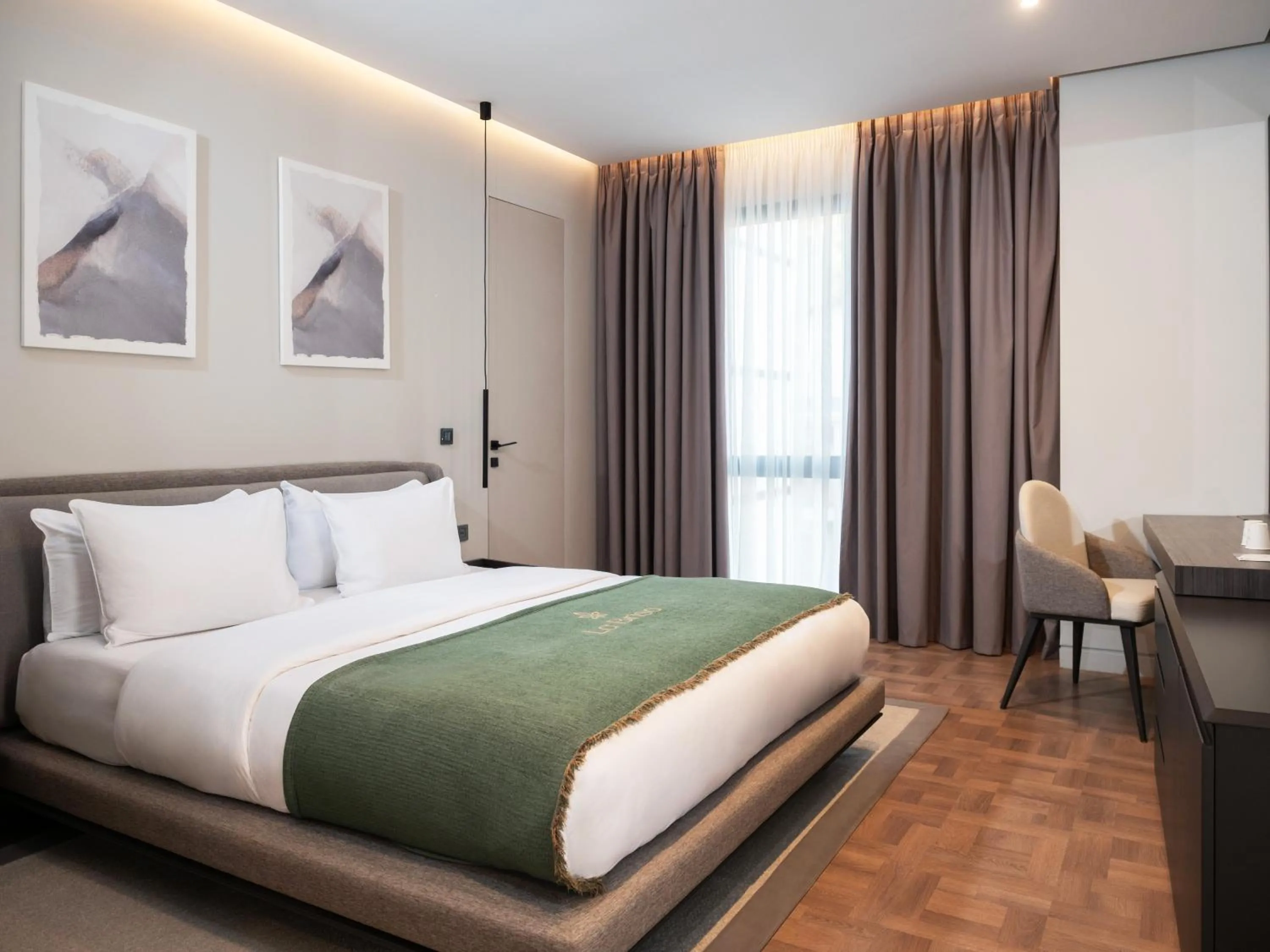 Bed in La Brisa Boutique Hotel