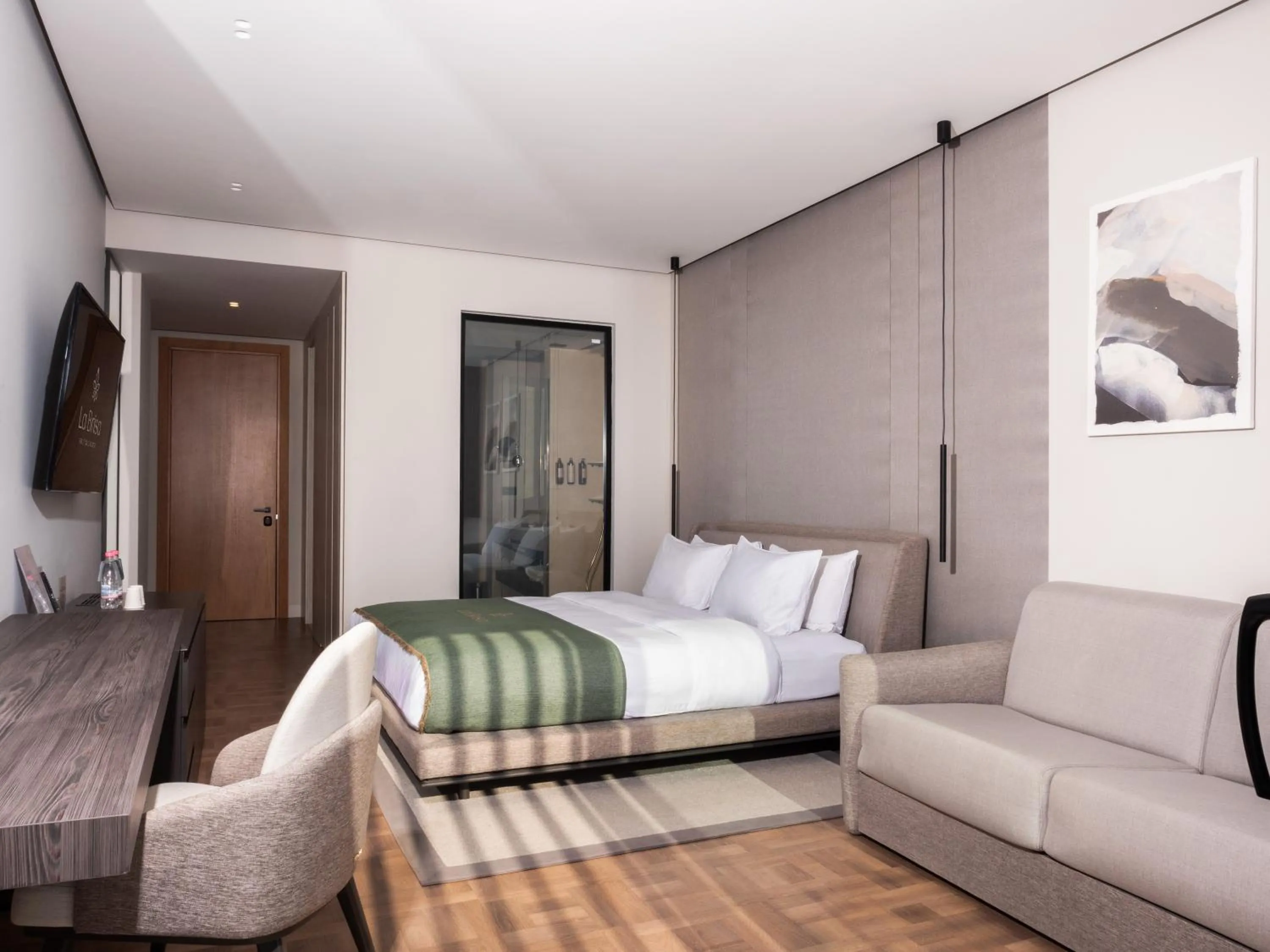 Bed in La Brisa Boutique Hotel