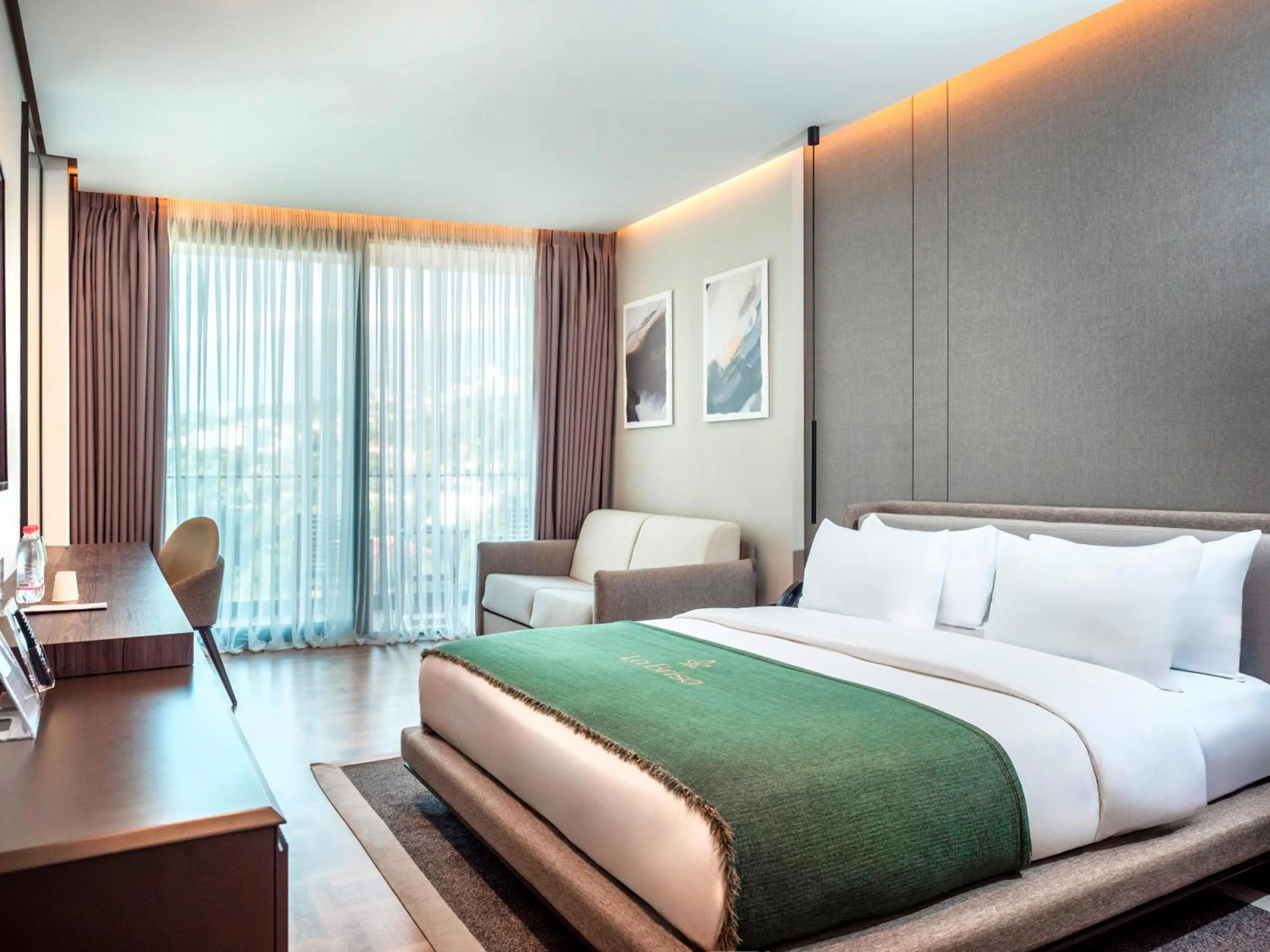 Bed in La Brisa Boutique Hotel