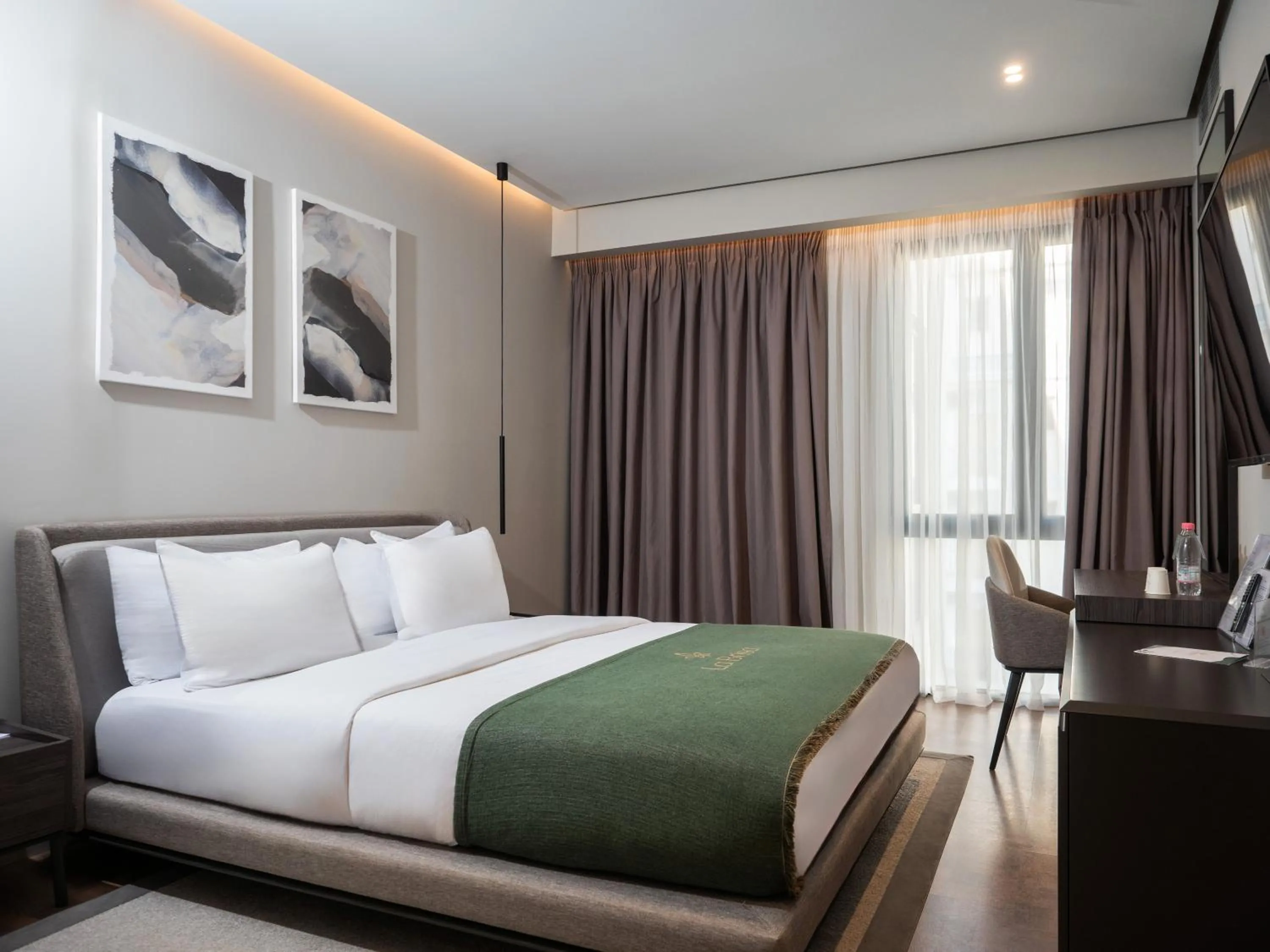 Bed in La Brisa Boutique Hotel