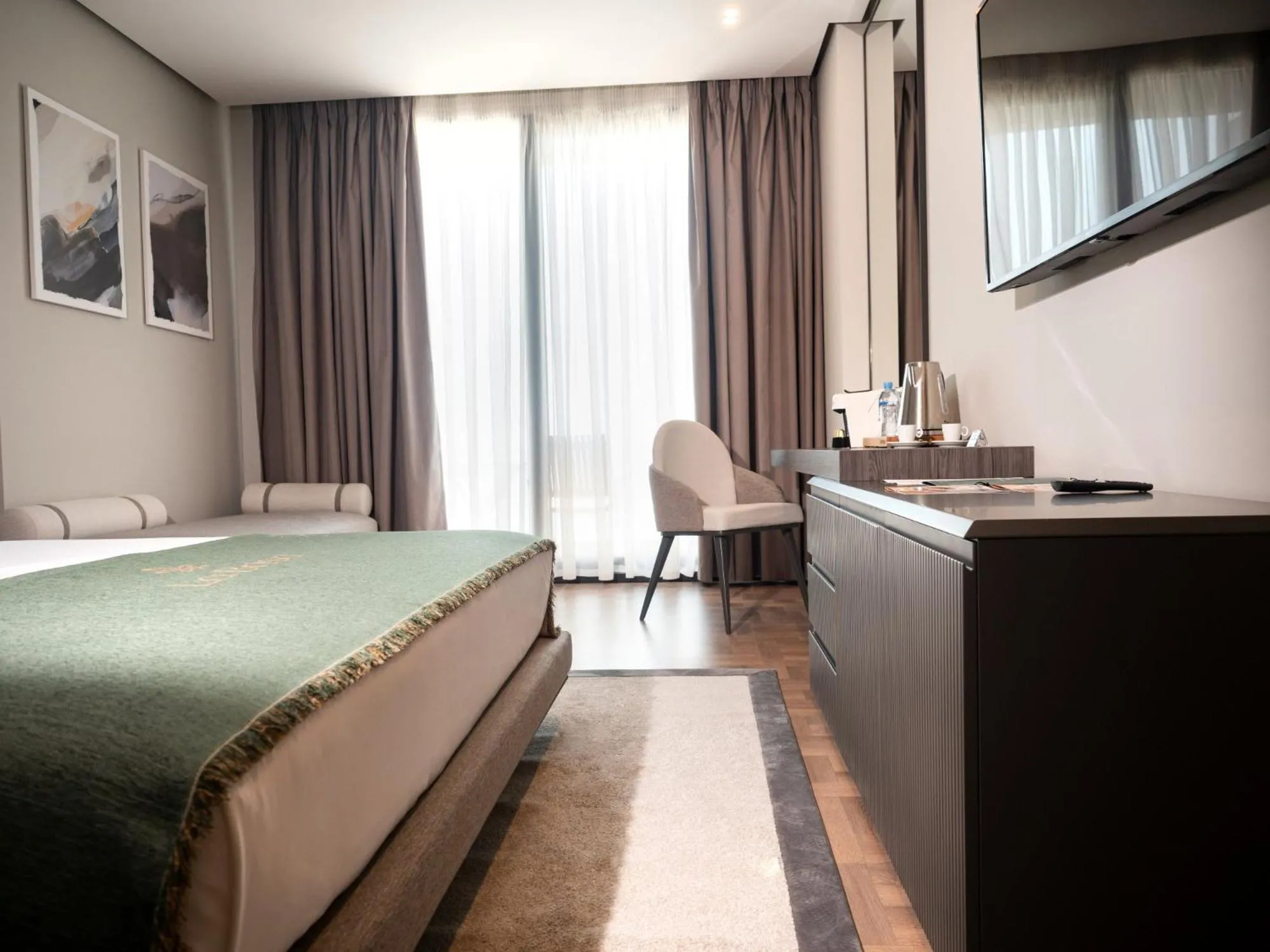 Bed in La Brisa Boutique Hotel