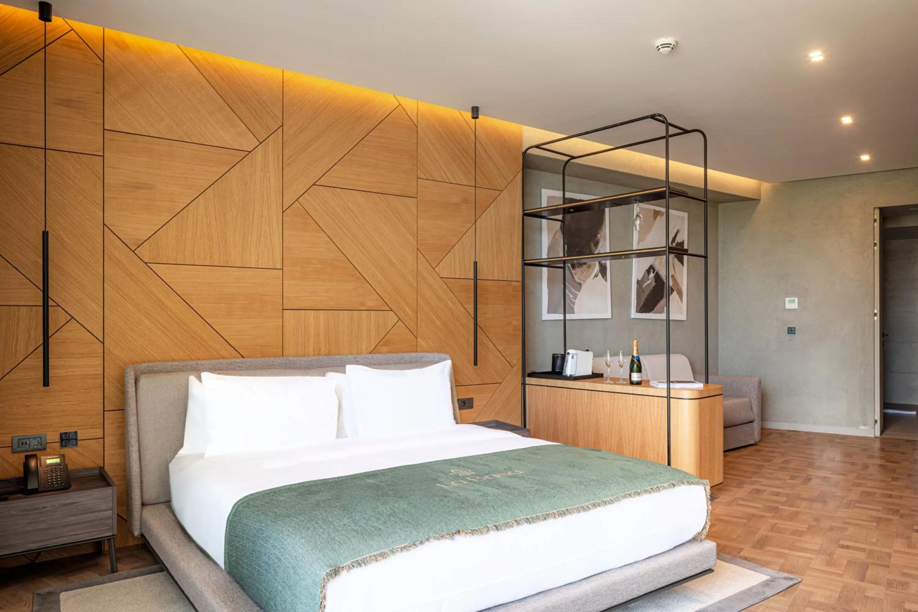 Bed in La Brisa Boutique Hotel