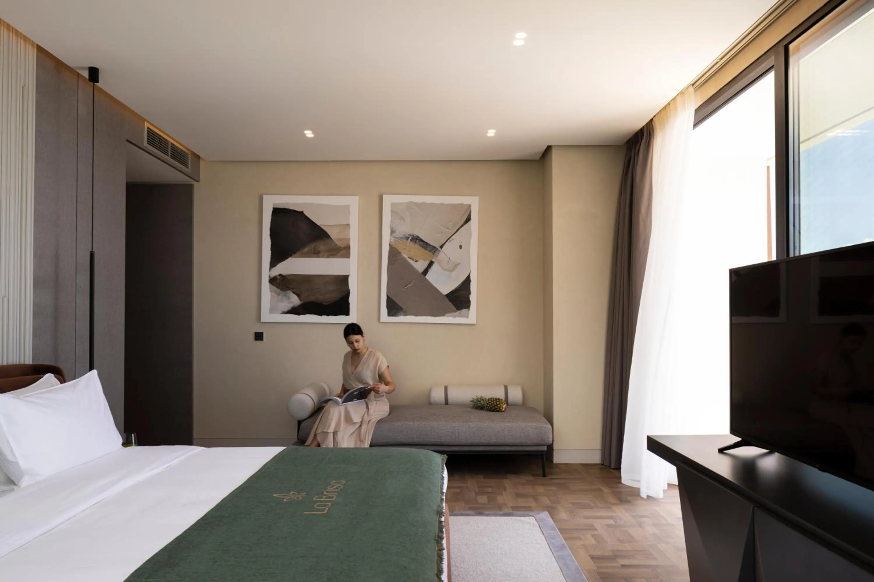 Bed in La Brisa Boutique Hotel