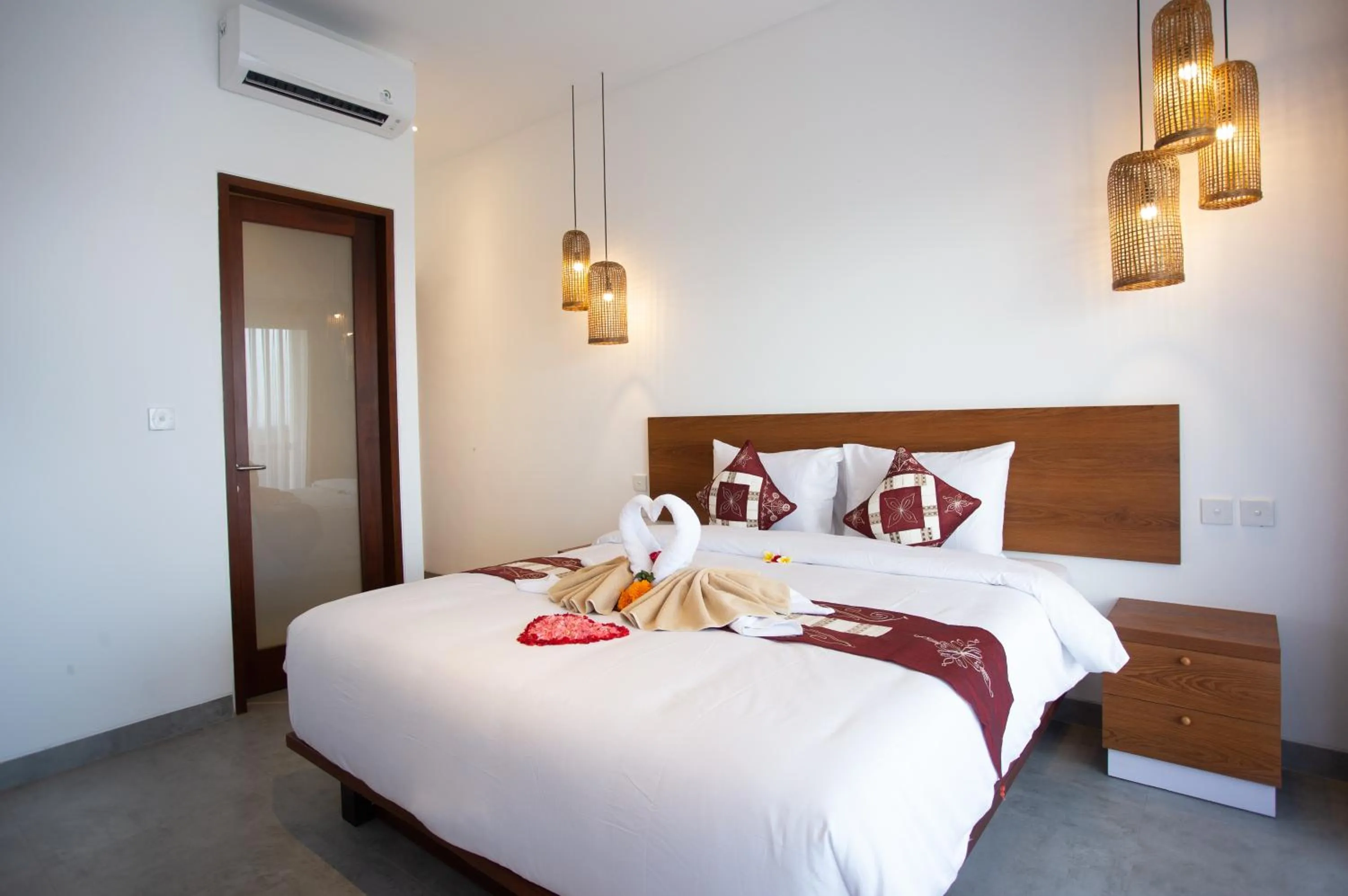 Bed in The Kd Suites & Coffee Shop