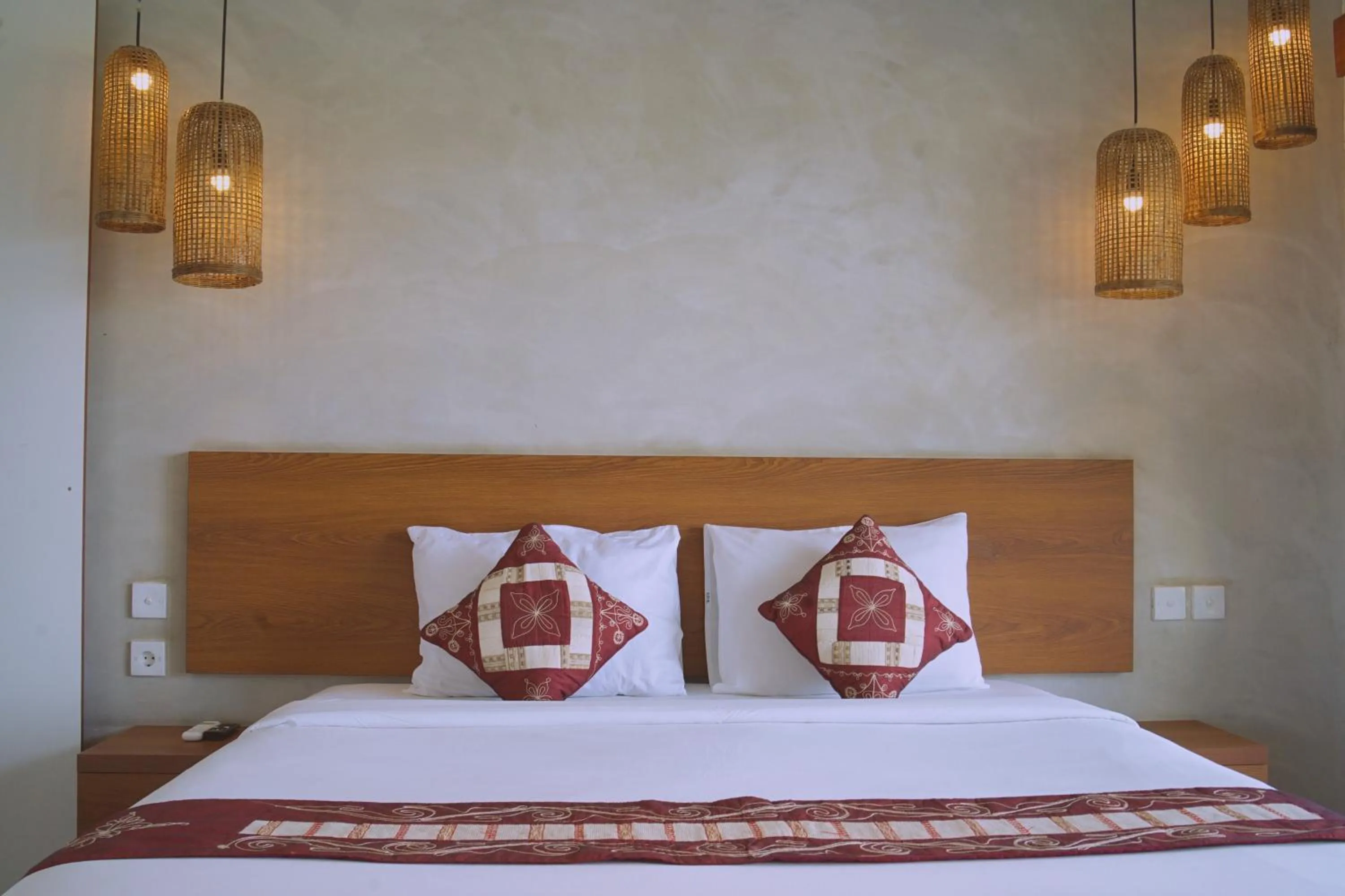 Bed in The Kd Suites & Coffee Shop