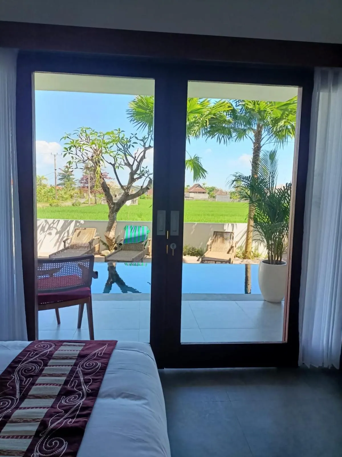 Bed in The Kd Suites & Coffee Shop