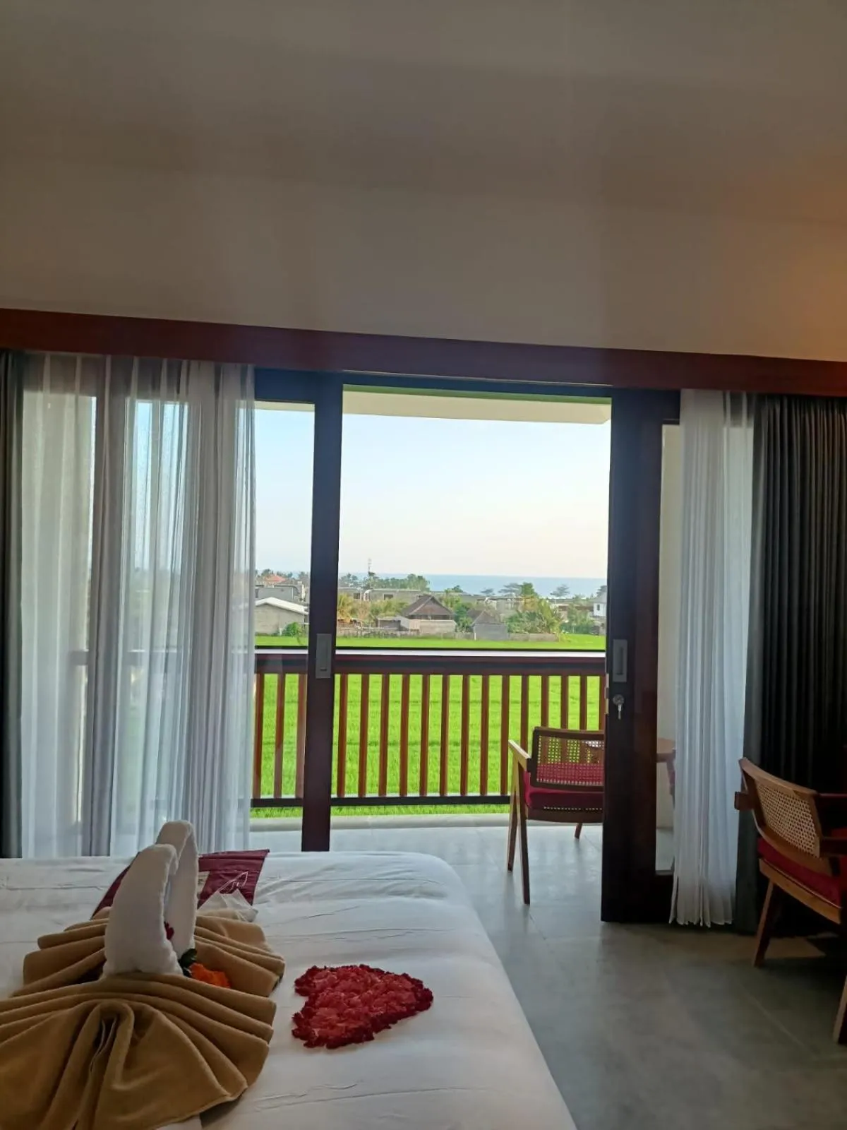 Bed in The Kd Suites & Coffee Shop