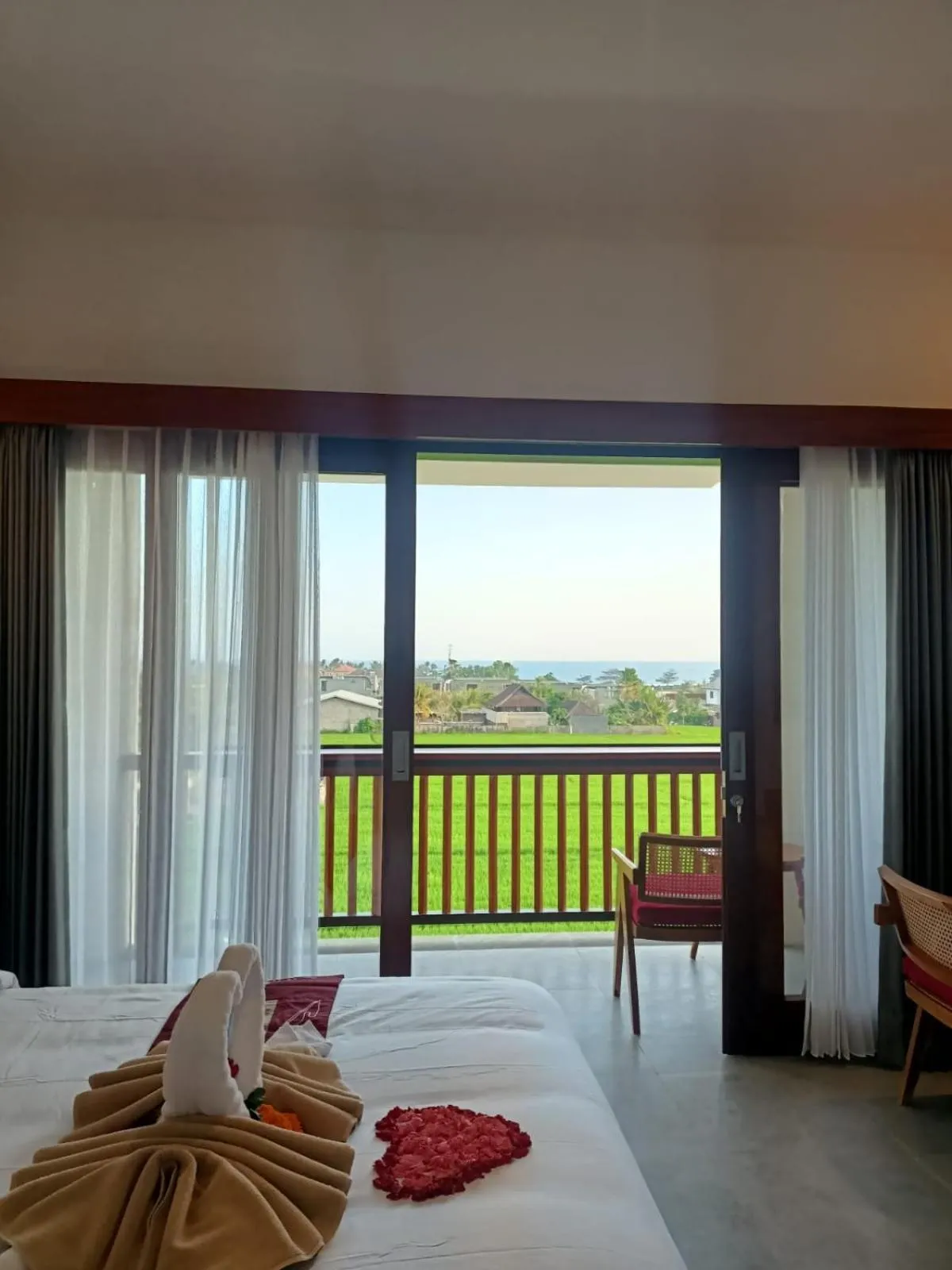 Bed in The Kd Suites & Coffee Shop