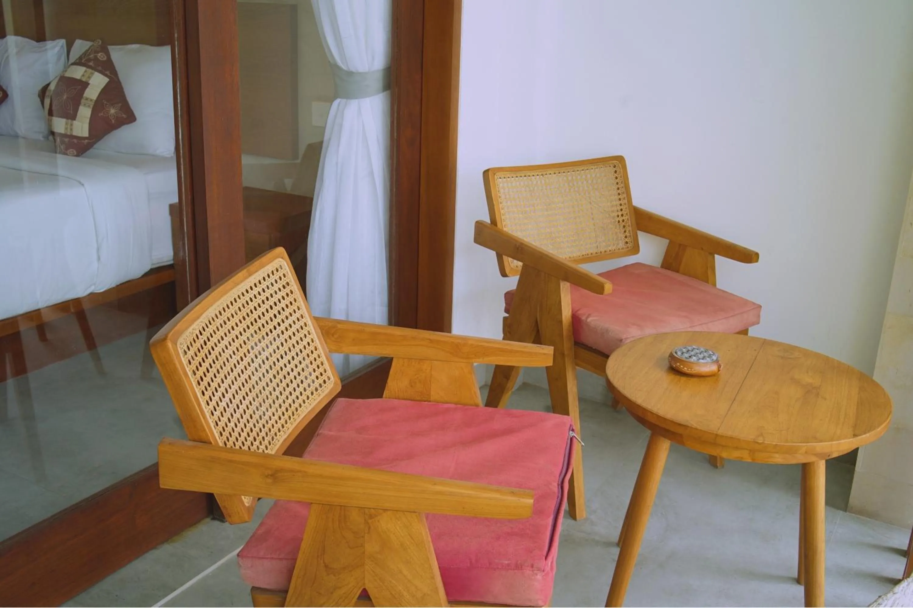 Seating area in The Kd Suites & Coffee Shop