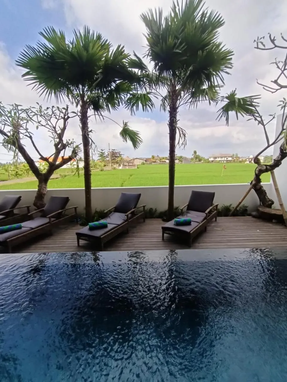 Swimming pool in The Kd Suites & Coffee Shop