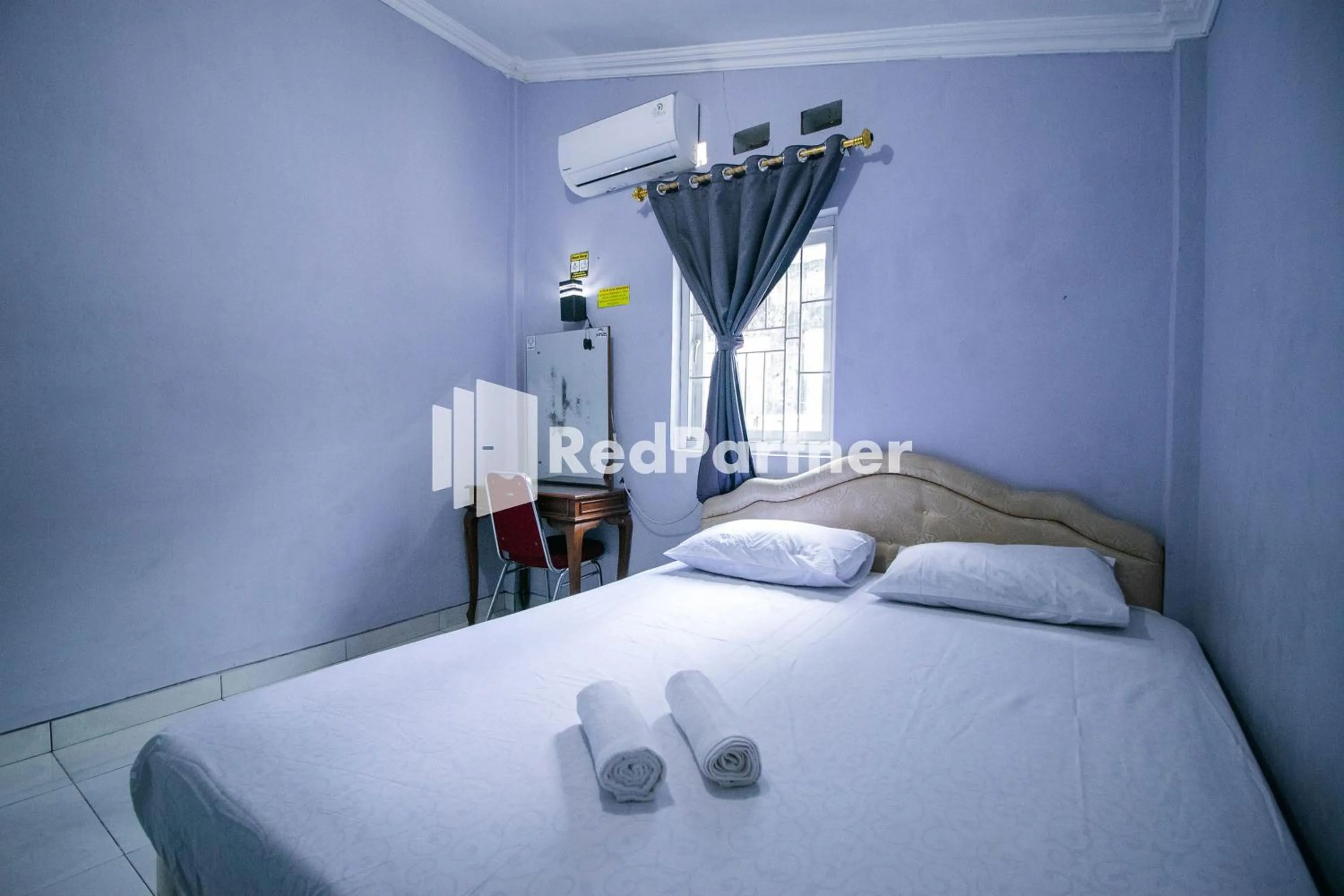 Bedroom, Bed in Kedyla Homestay Syariah Patangpuluhan Malioboro Area Yogyakarta RedPartner