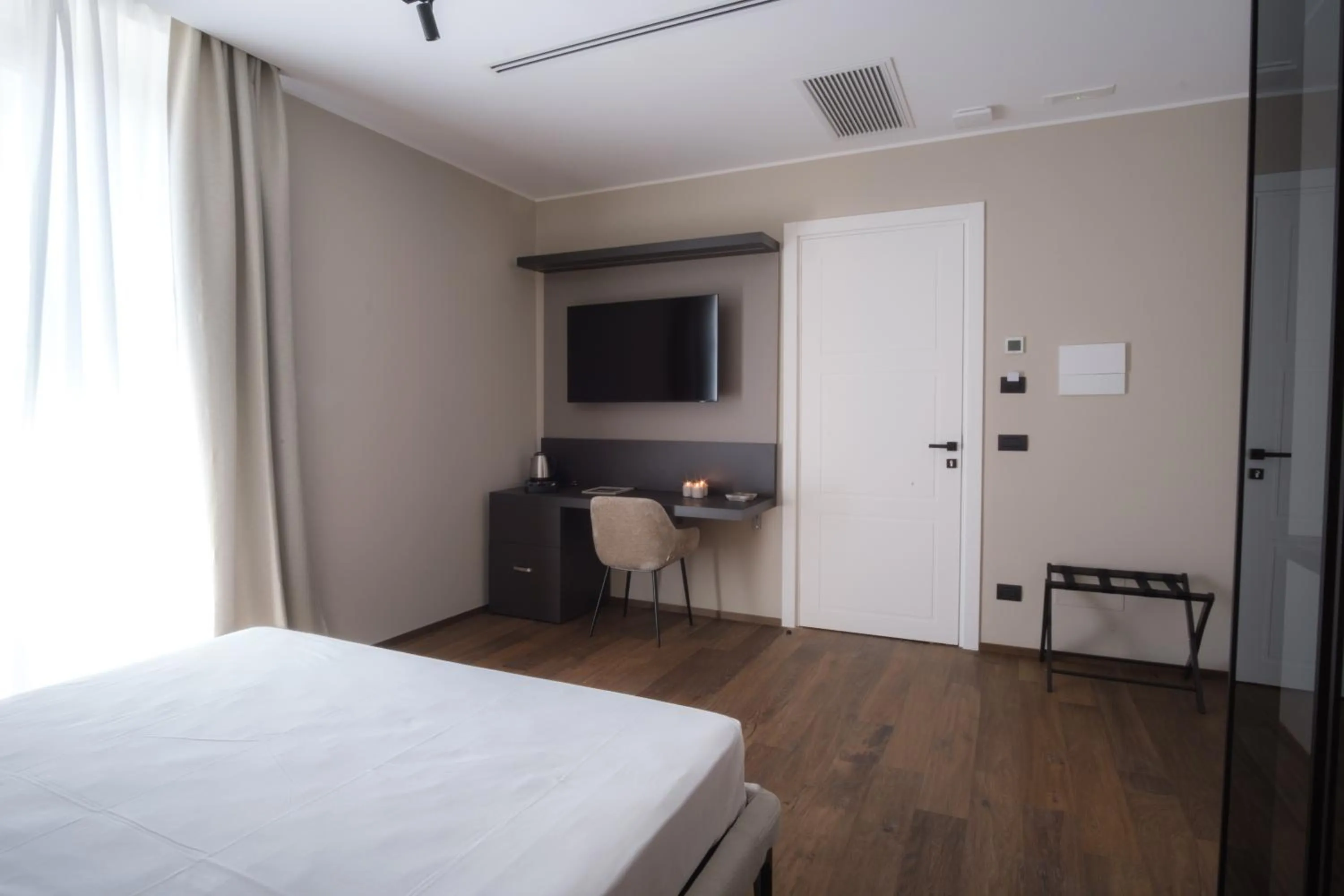 Bed in PALAZZO DANISI ROOMS&SUITES