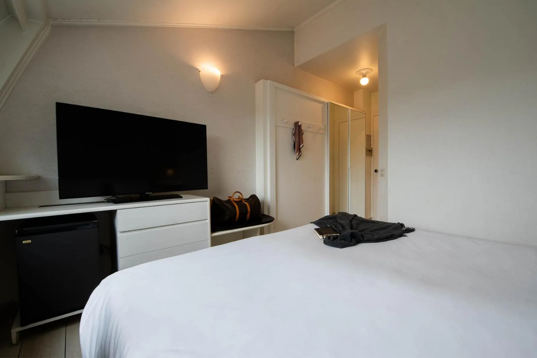 Bed in Axolute Comfort Hotel Como Cantù