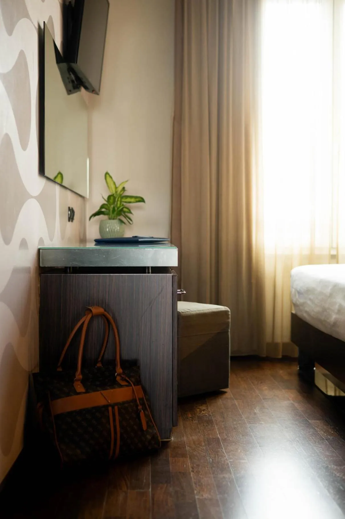 Bed in Axolute Comfort Hotel Como Cantù