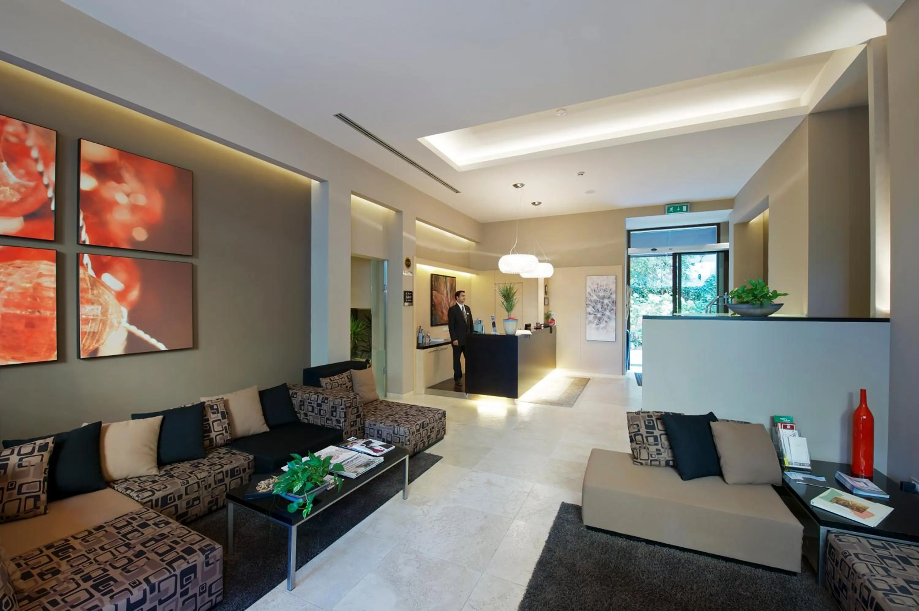 Lobby or reception in UNAHOTELS Villa dei Platani Foligno