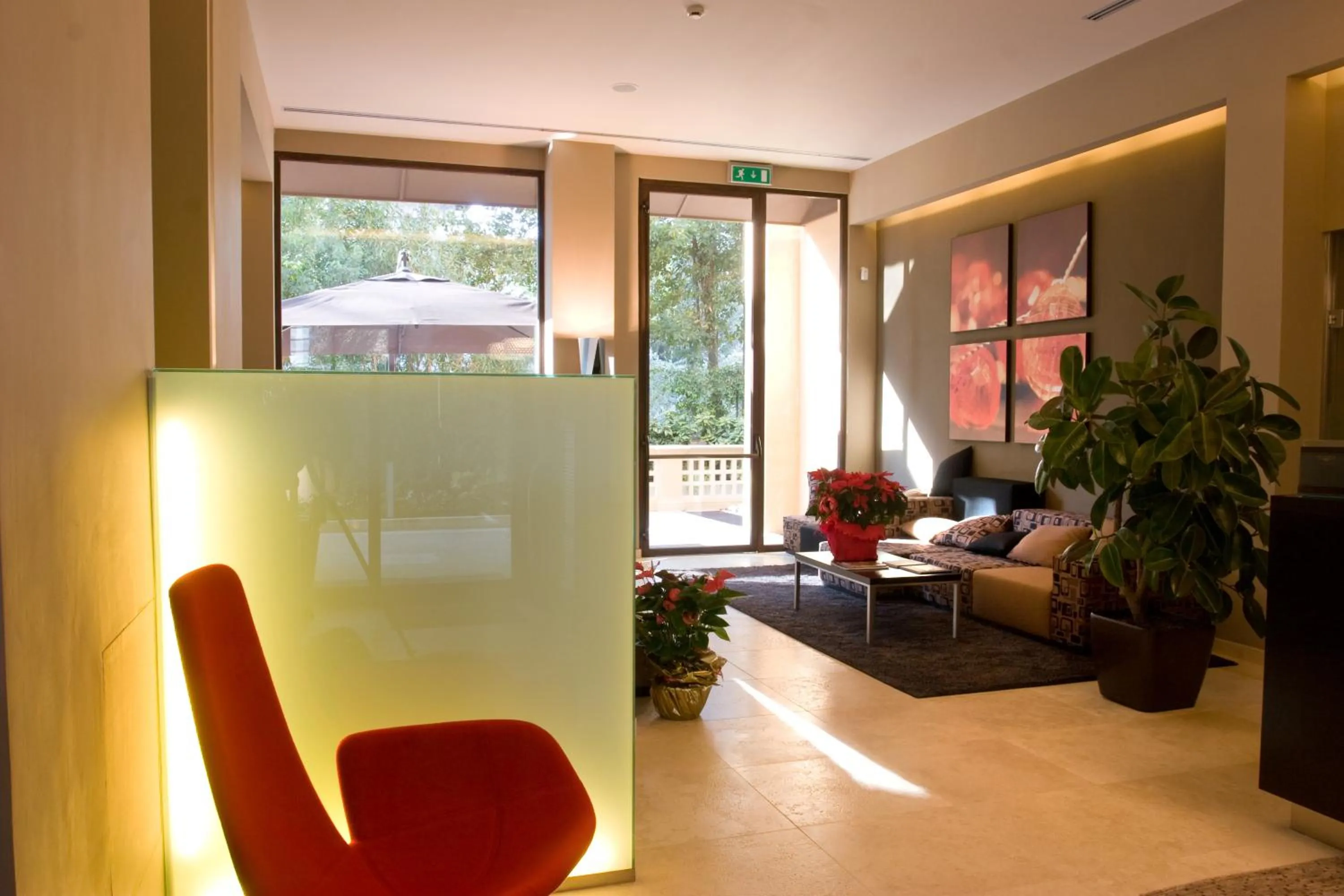 Lobby or reception in UNAHOTELS Villa dei Platani Foligno