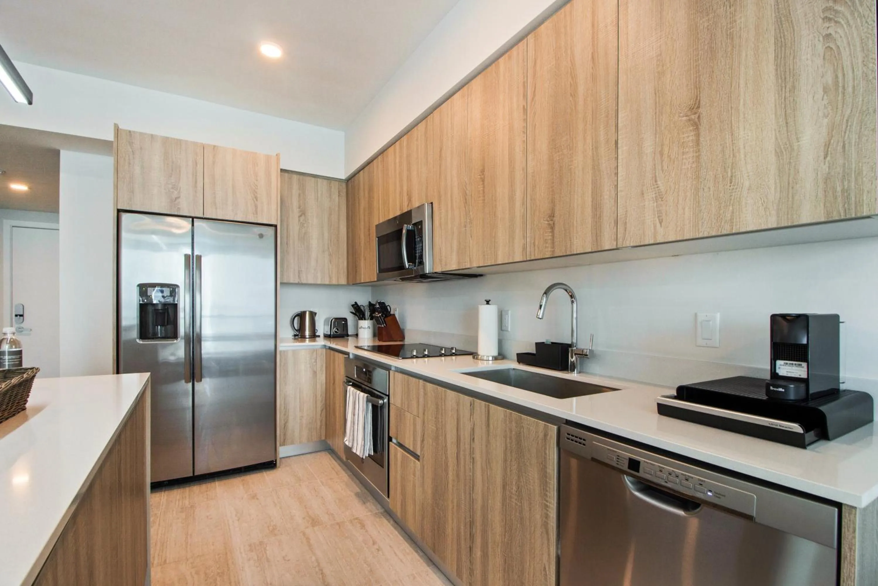 Kitchen or kitchenette in Nomada Destination Residences - Quadro