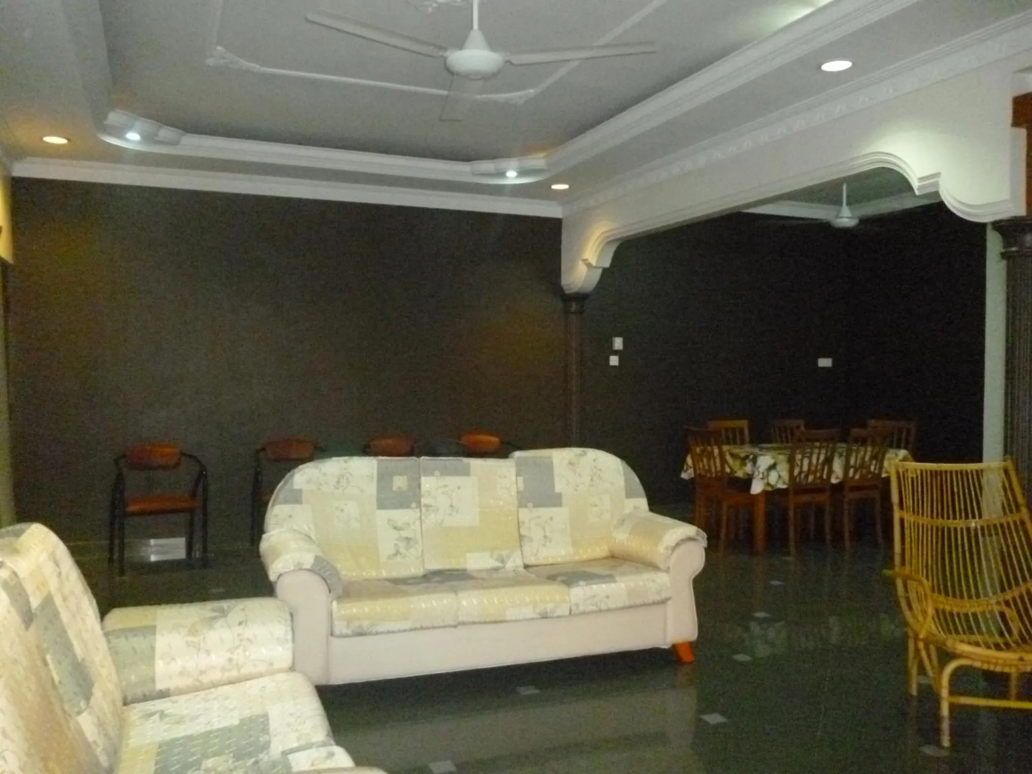 Communal lounge/ TV room in G Six Hotel