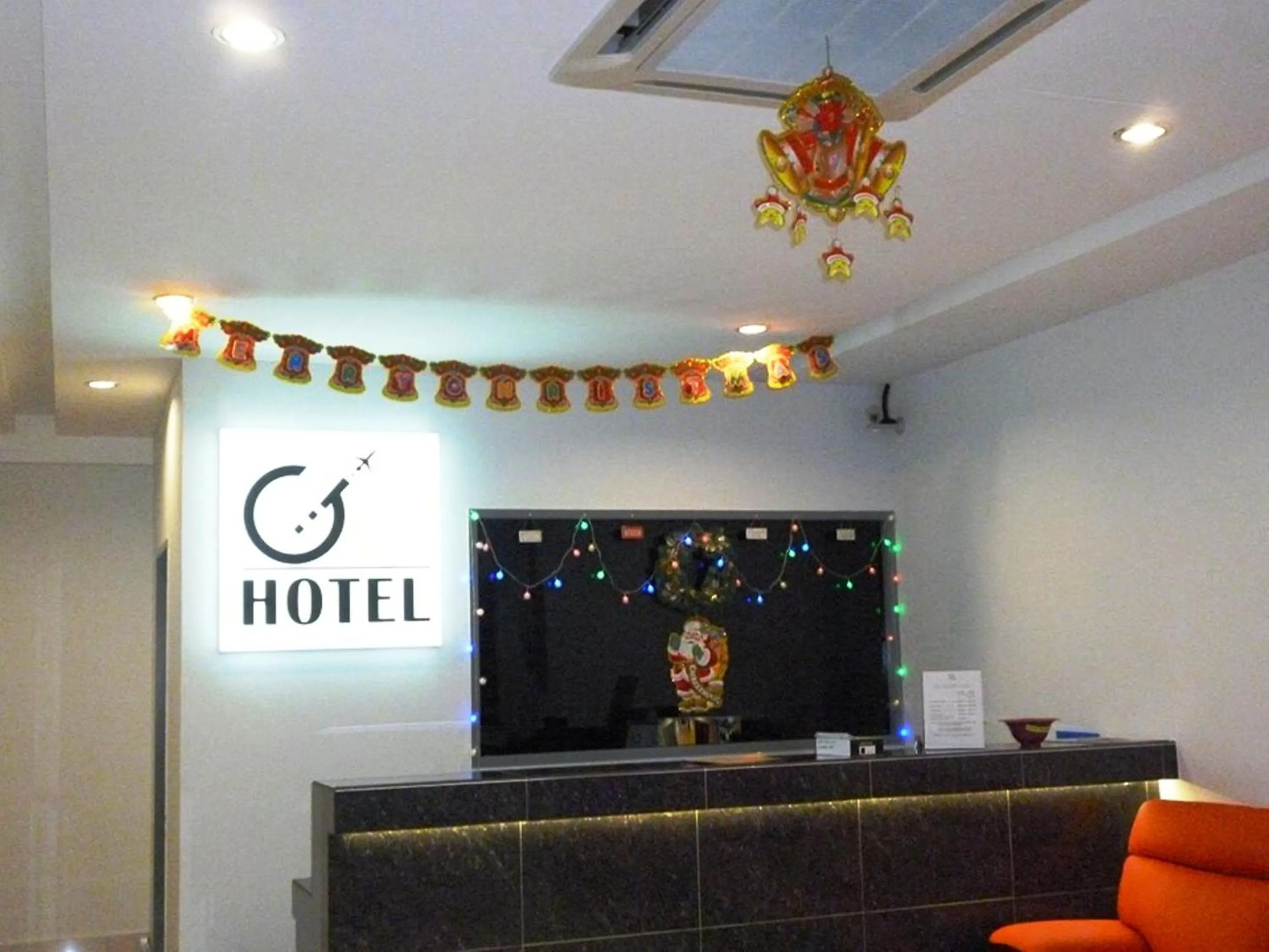 Lobby or reception in G Six Hotel