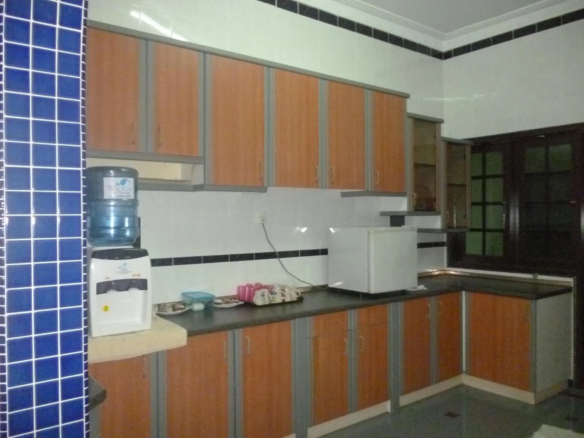 Communal kitchen in G Six Hotel