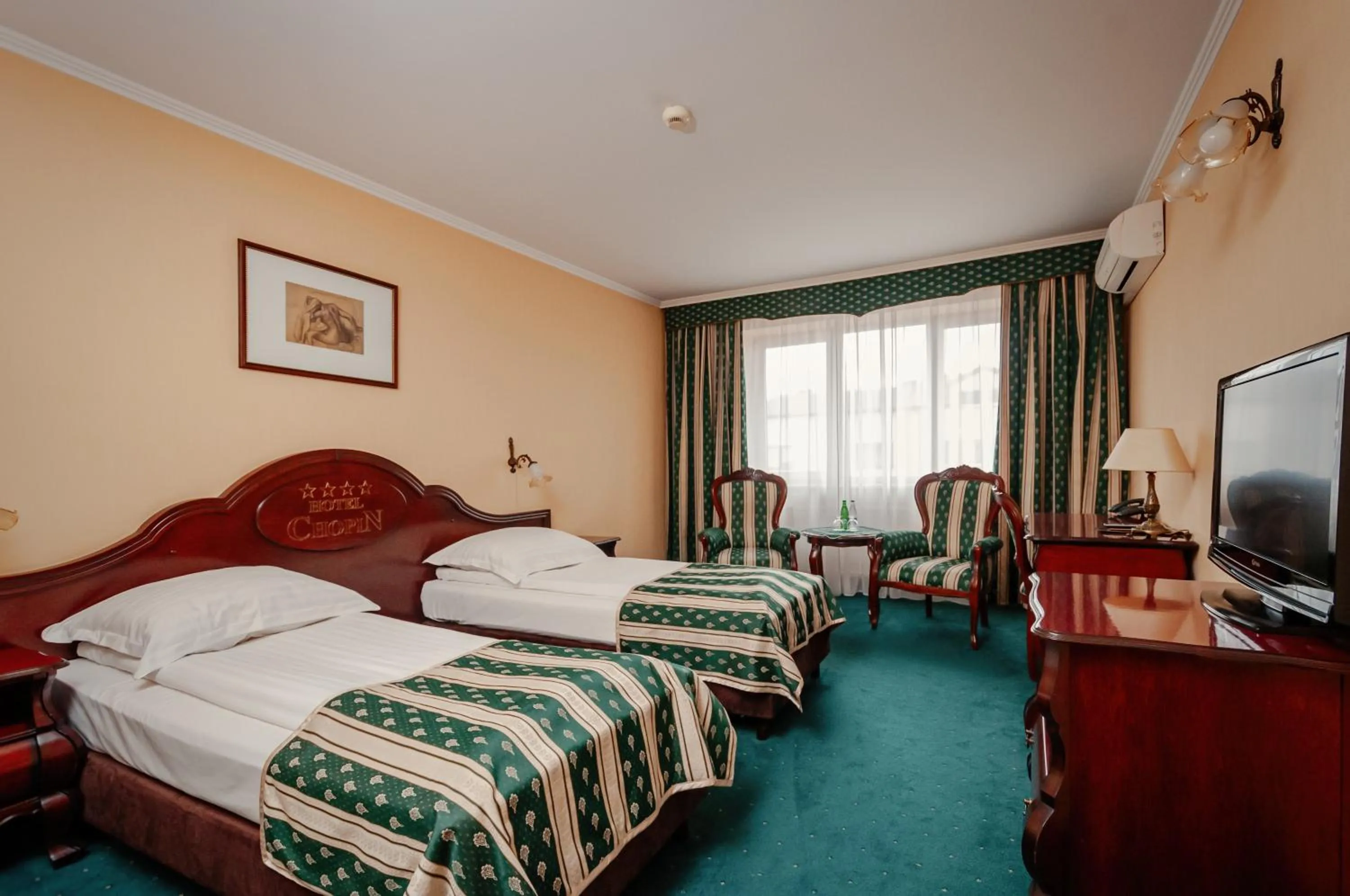 Bed in Hotel Chopin Business&SPA