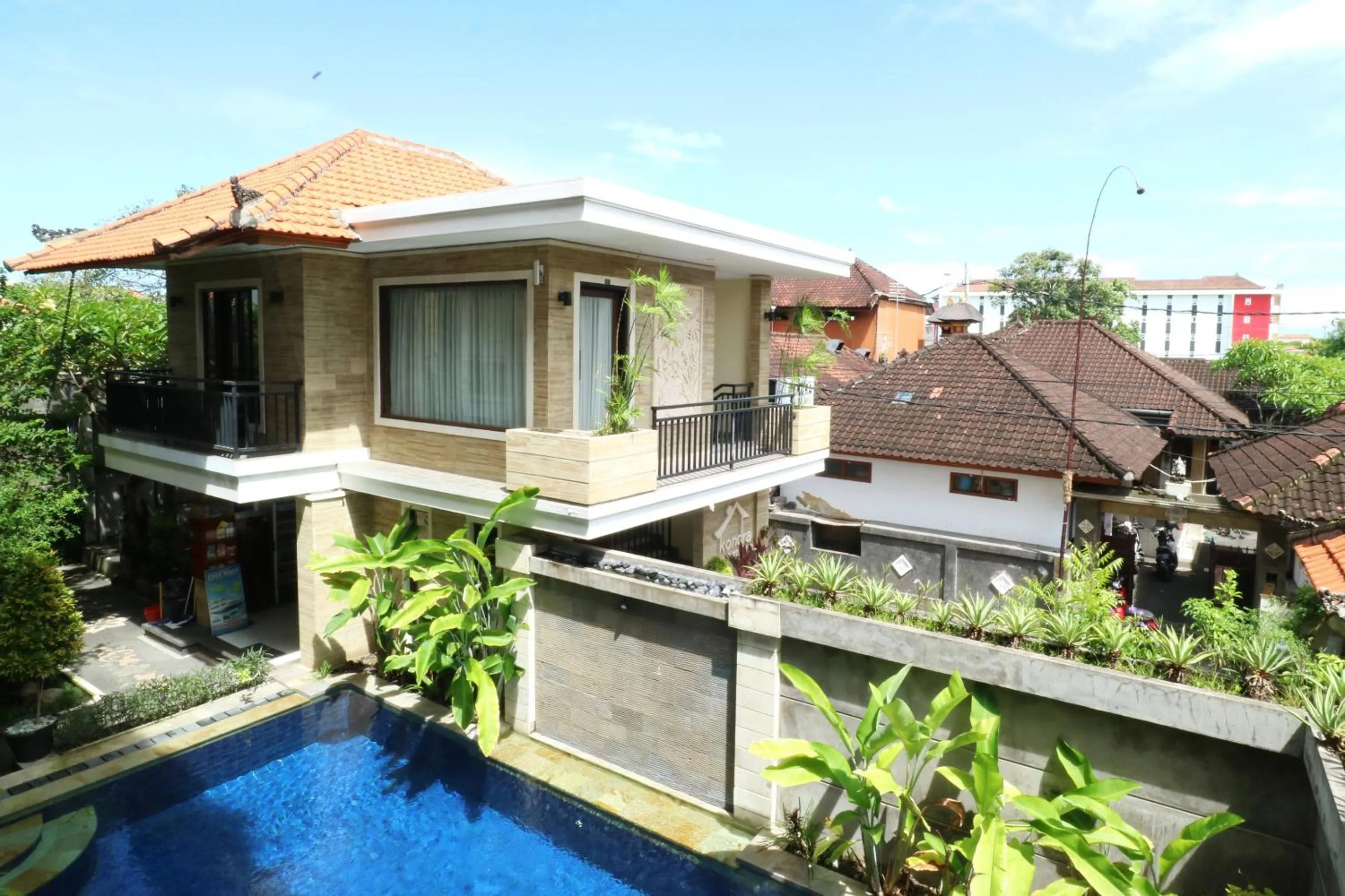 Swimming pool in Kondra Premiere Guest House Kuta