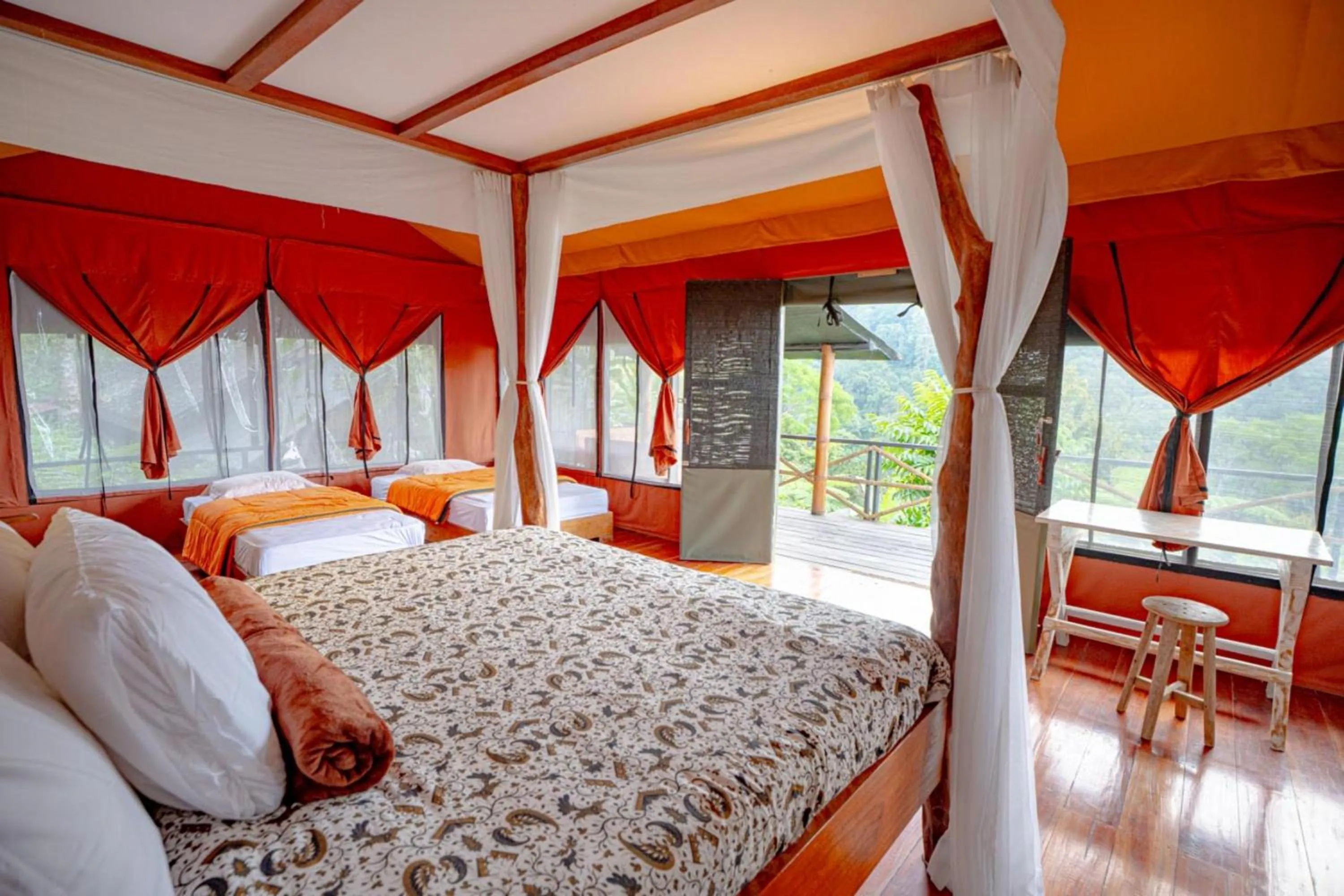 Bed in Sang Giri Mountain Tent Resort