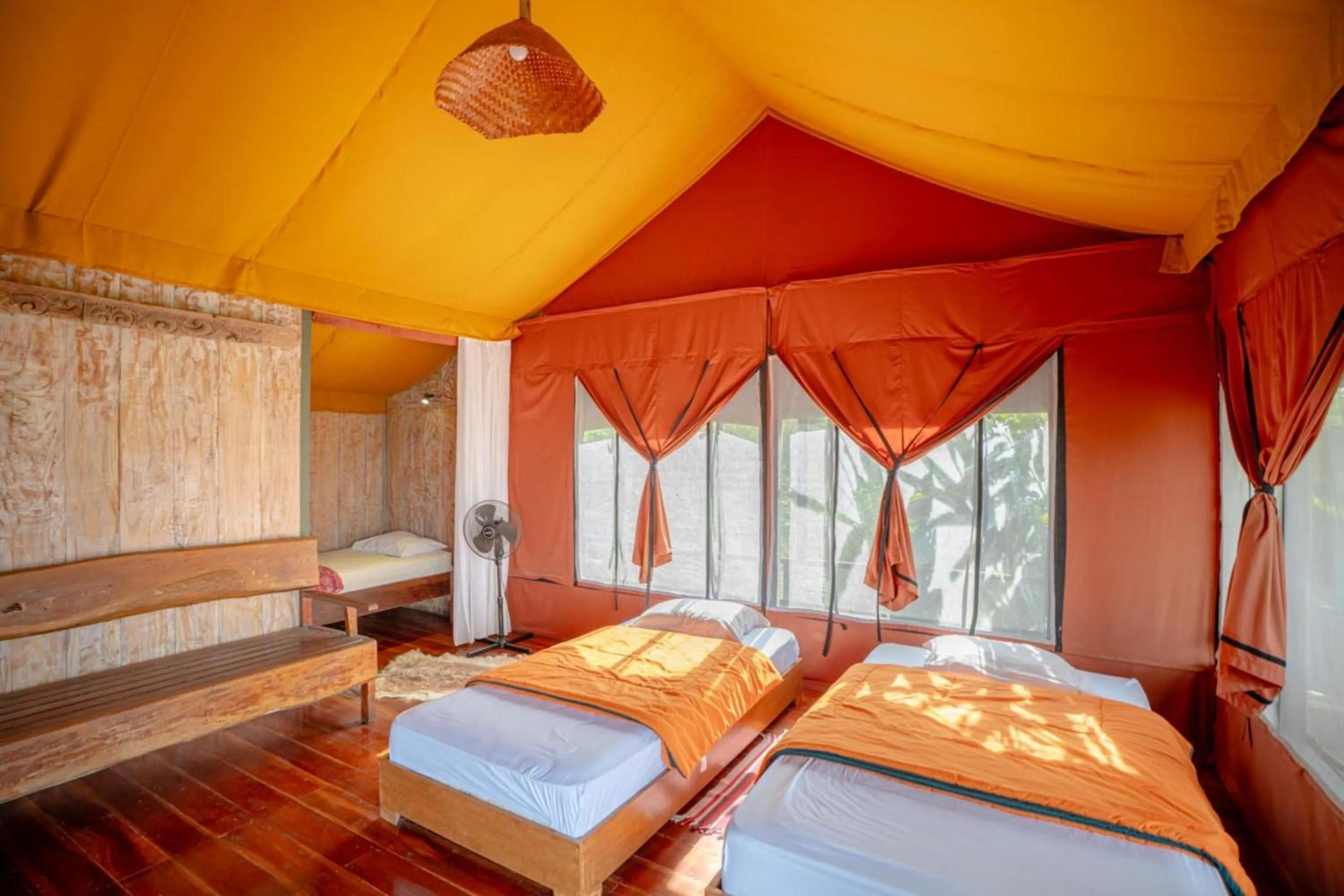 Bed in Sang Giri Mountain Tent Resort