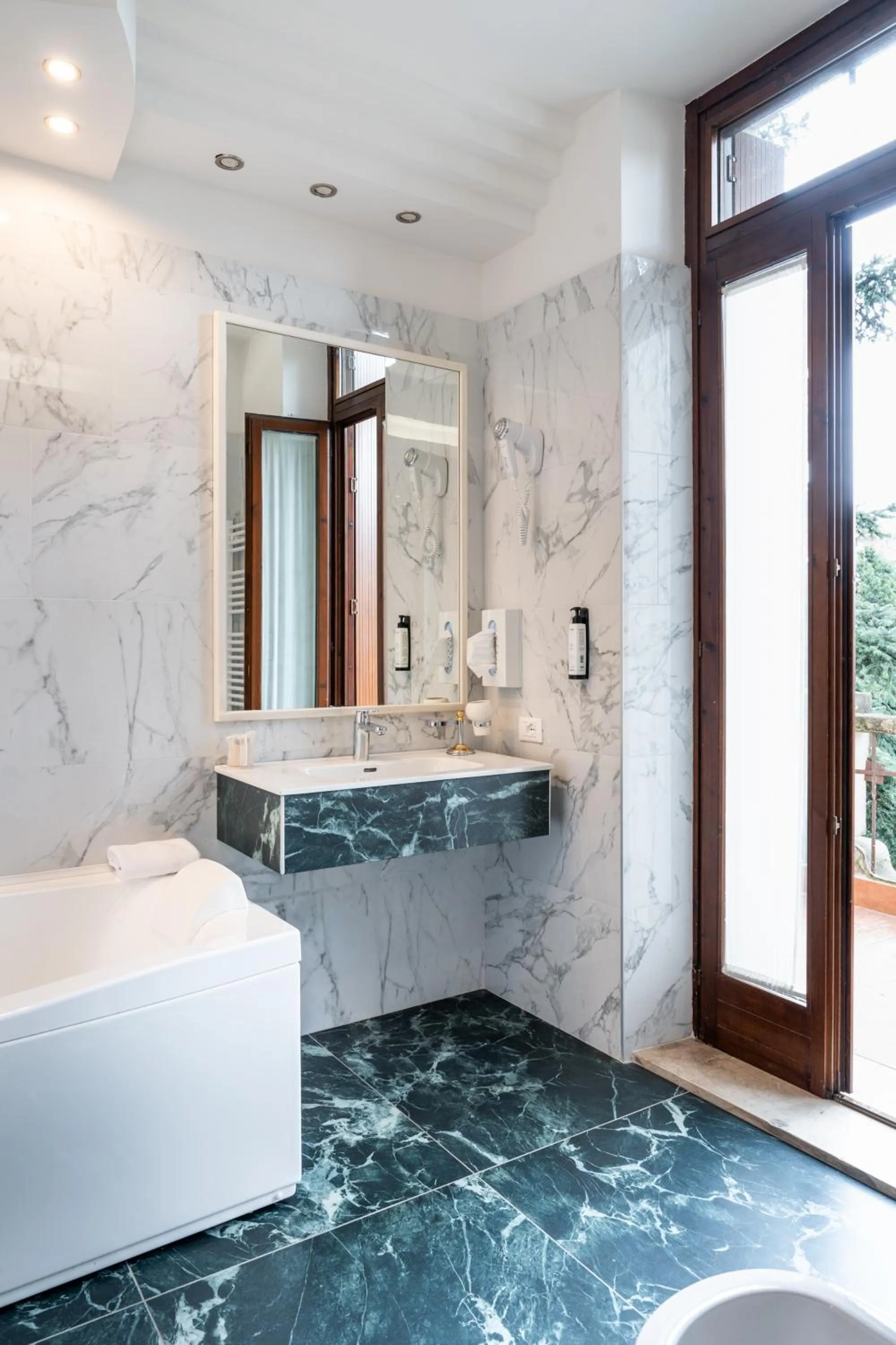 Bathroom in Hotel San Marco Fitness Pool & Spa