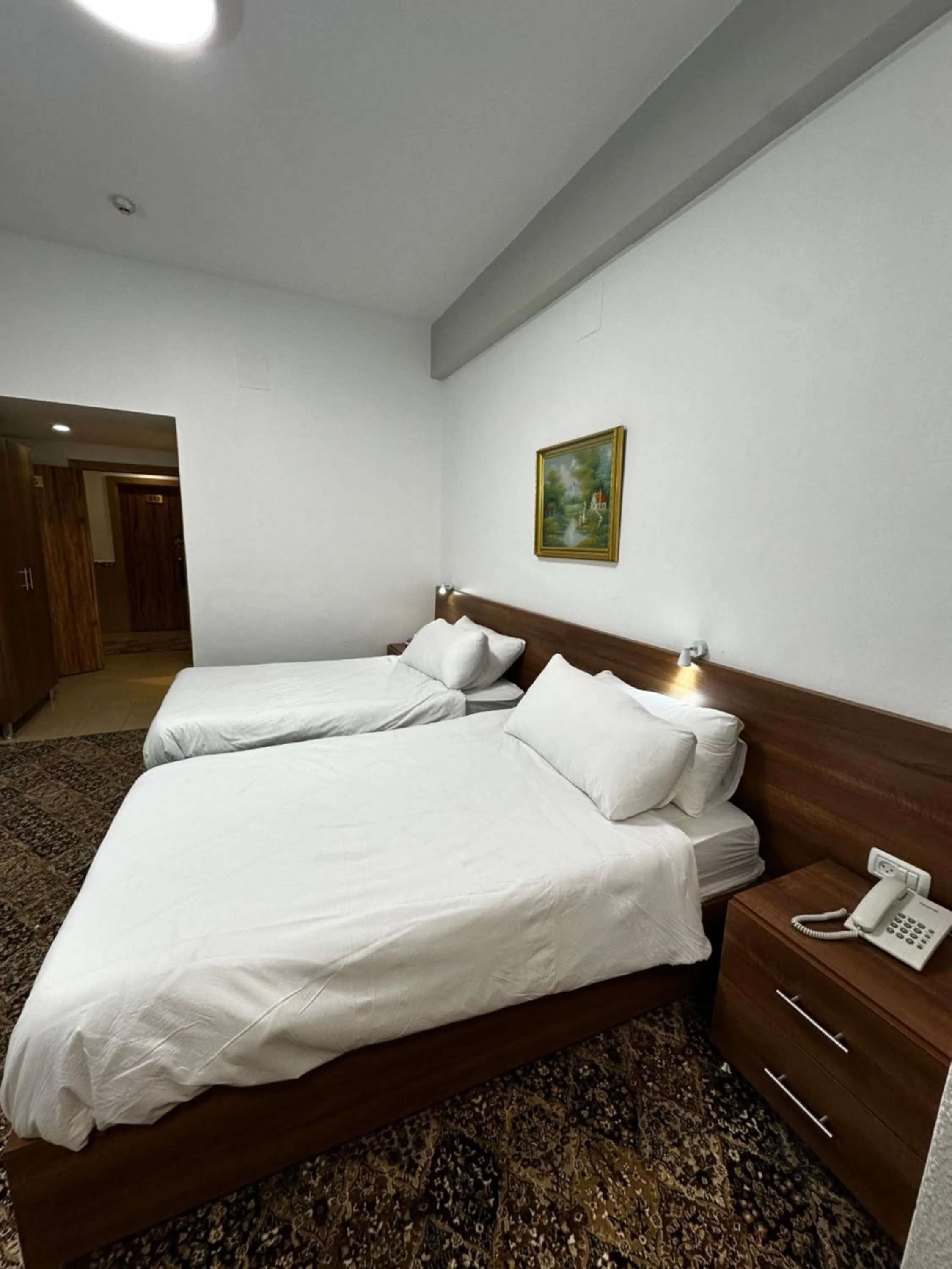 Bed in Shepherd Hotel