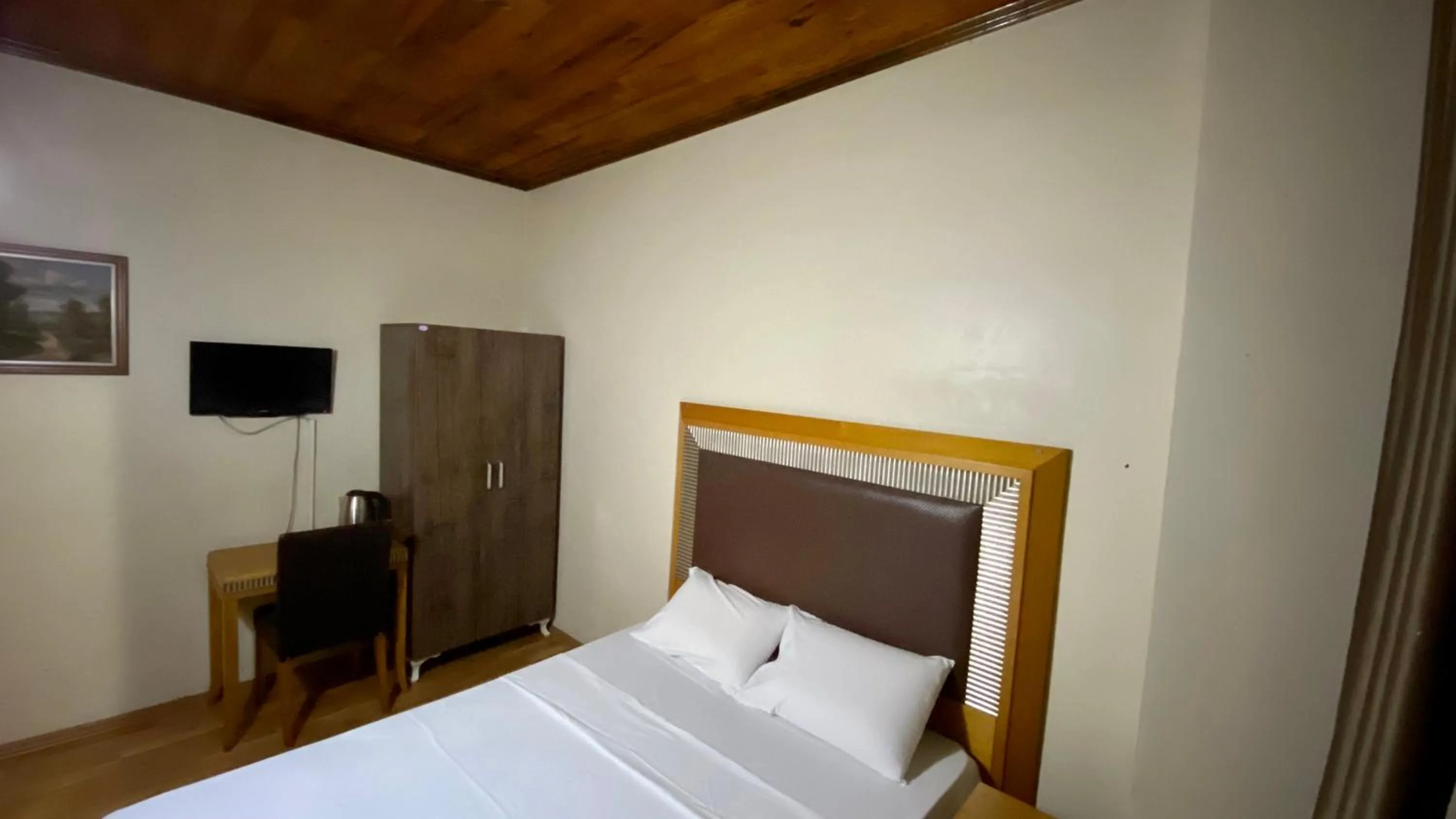 Bed in Herton Boutique Hotel