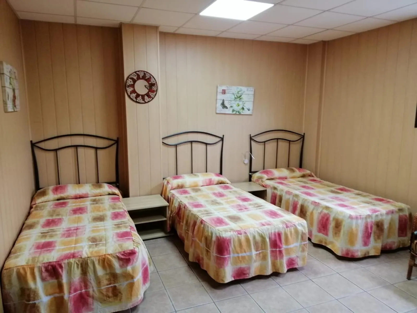 Bed in Albergue de Peregrinos A Santiago