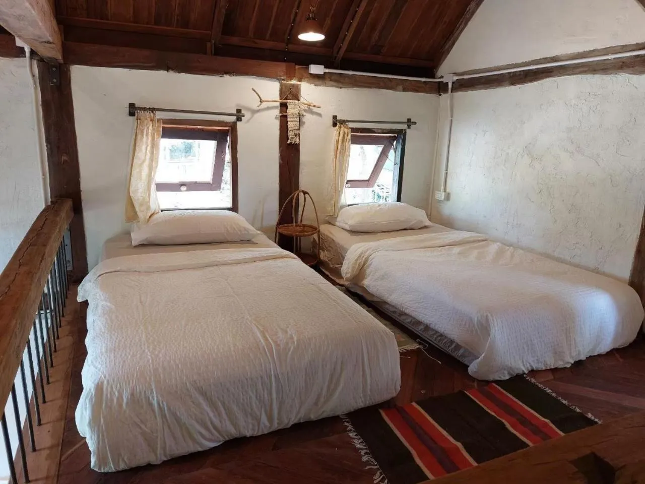 Bed in THE RIVER RUNS CHIANG KLANG