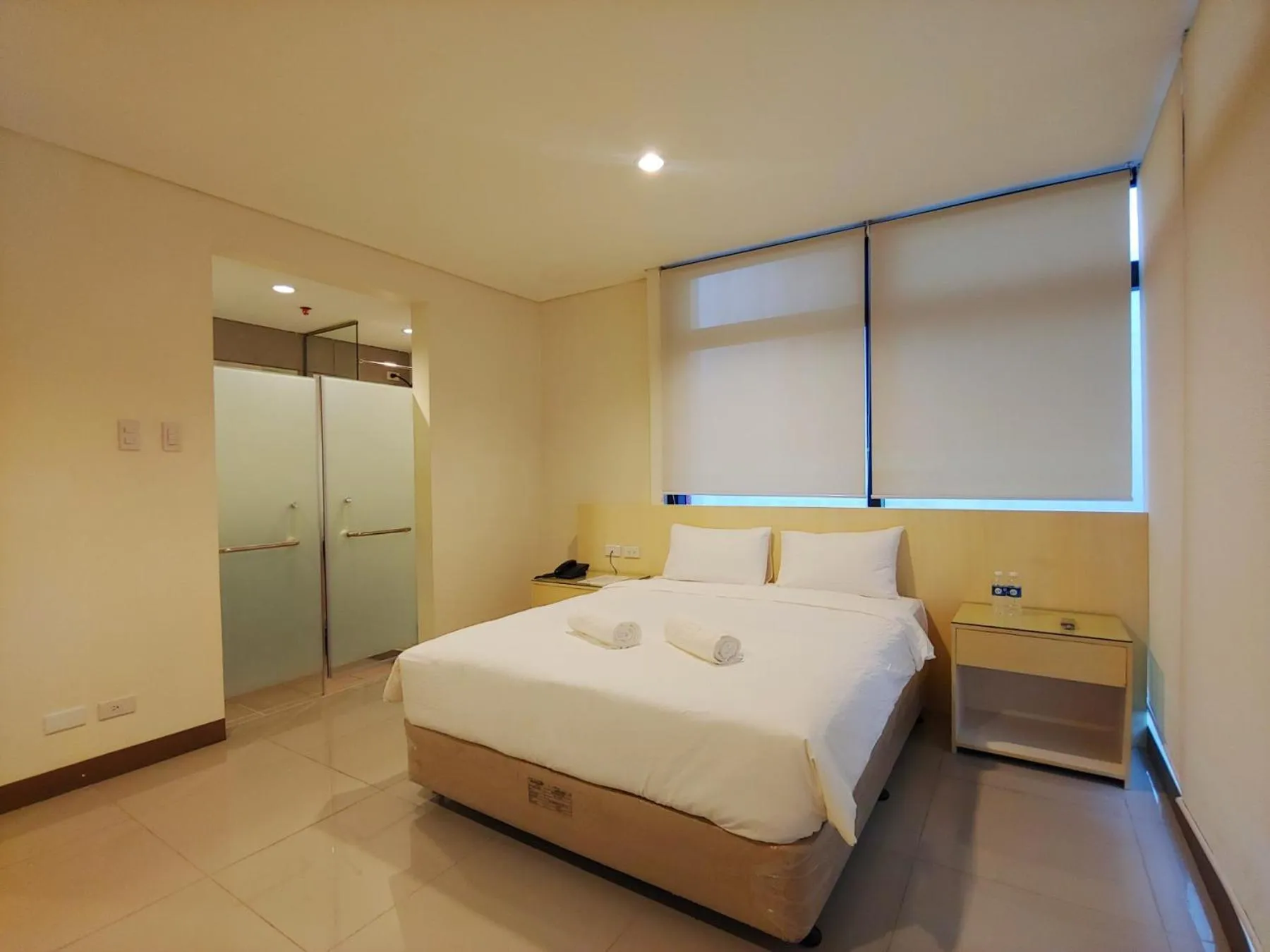Photo of the whole room, Bed in Kaizen Suites