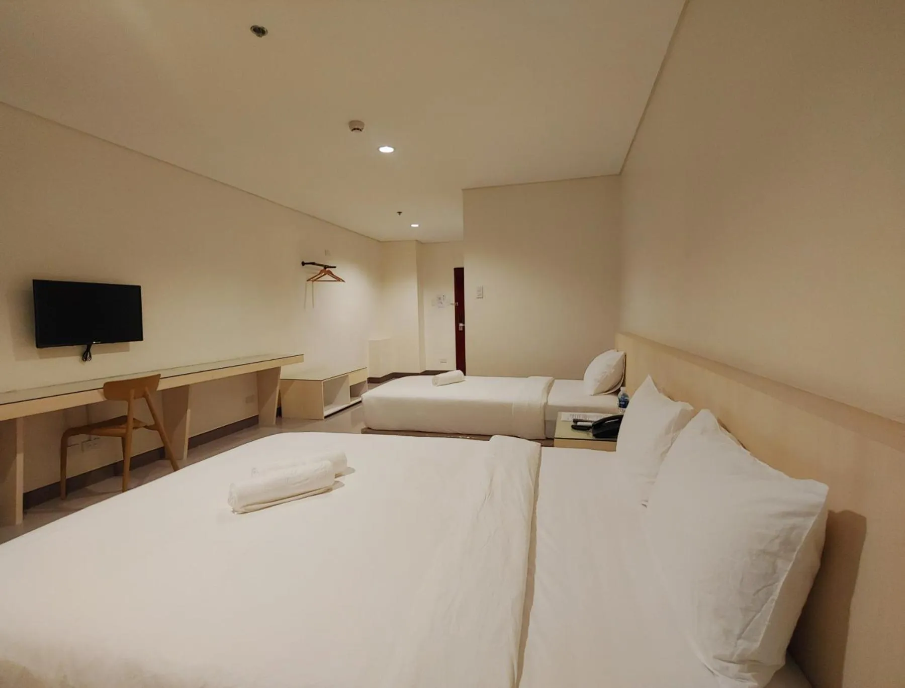Photo of the whole room, Bed in Kaizen Suites