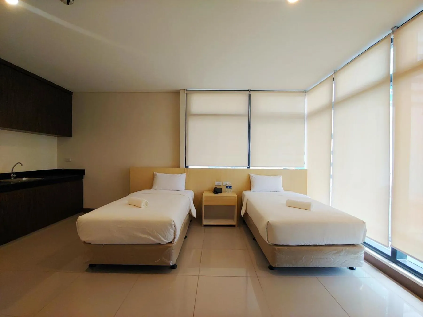 Bed in Kaizen Suites