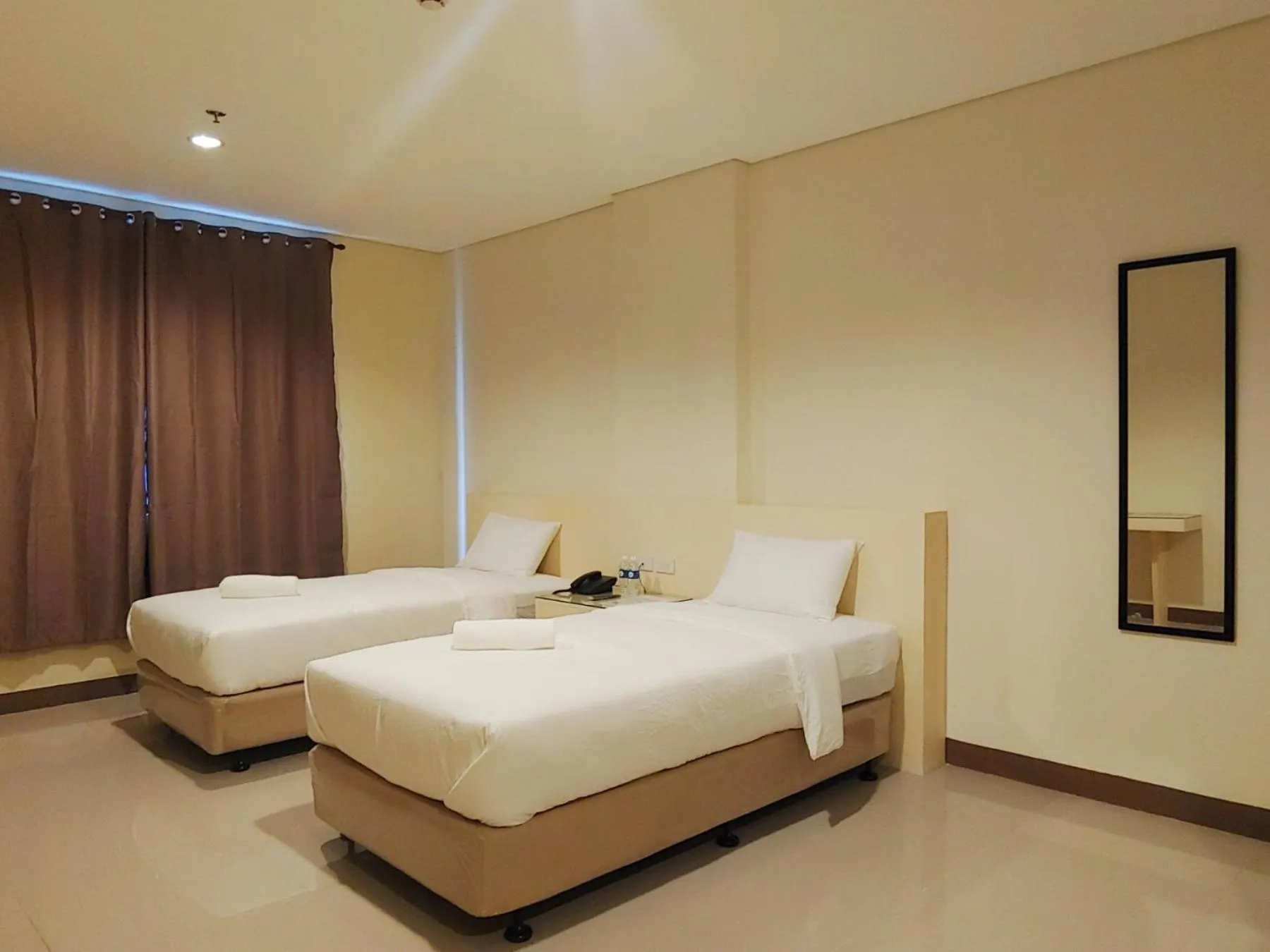Bed in Kaizen Suites